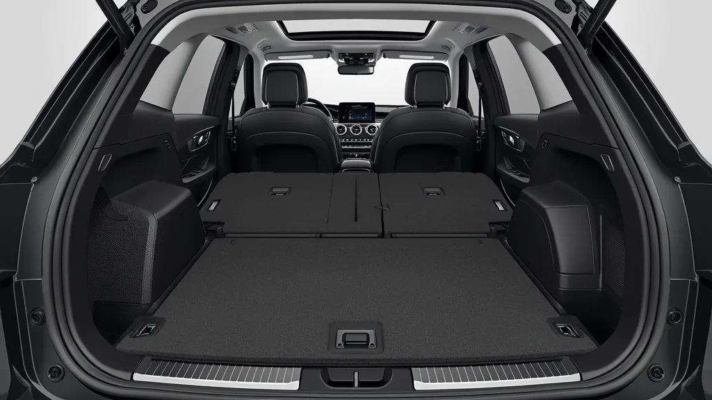 Rear view of Mercedes GLC cargo capacity with folded seats, demonstrating ample space for luggage.