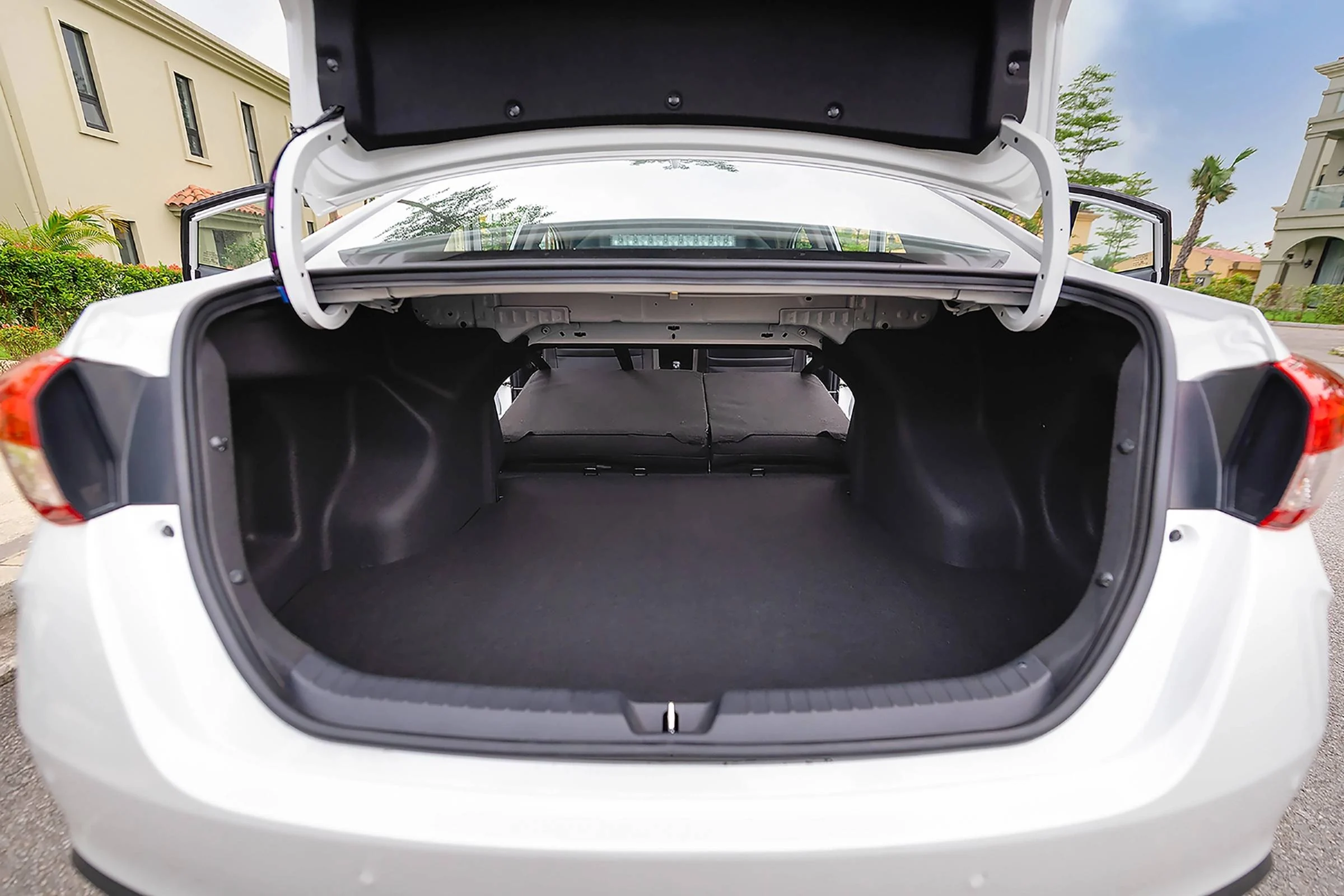 Toyota Vios, first car, young family car, affordable sedan, fuel efficient car, safety features, low maintenance, resale value 4