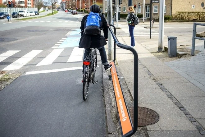 bike lanes, cycling infrastructure, dedicated bike lanes, bike lane design, cycling safety, urban transportation, bike lane examples 2