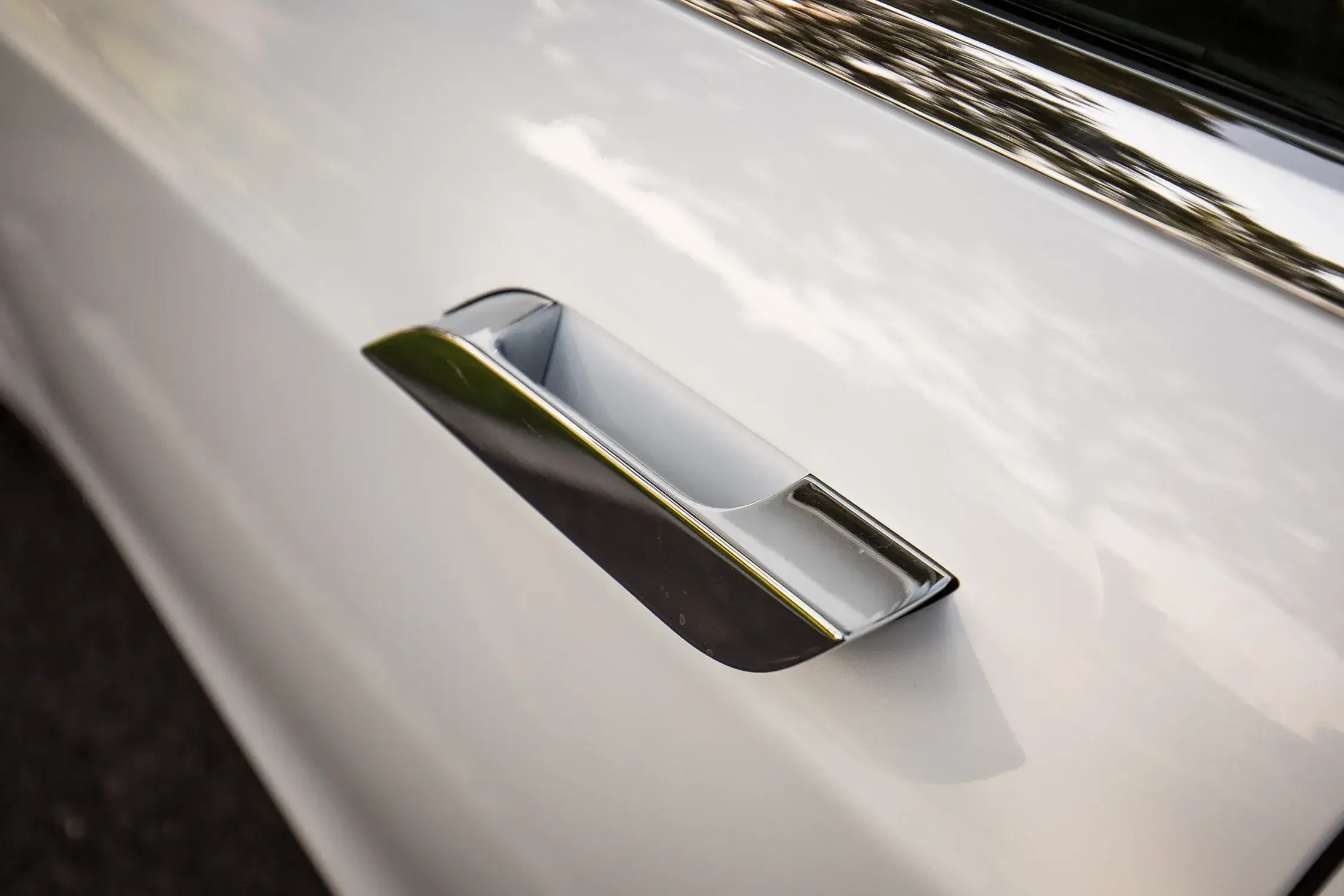 electric car door handle ban, China automotive safety, hidden door handle, vehicle design regulations, 2027 car safety law, electric vehicle safety, automotive aerodynamics 3