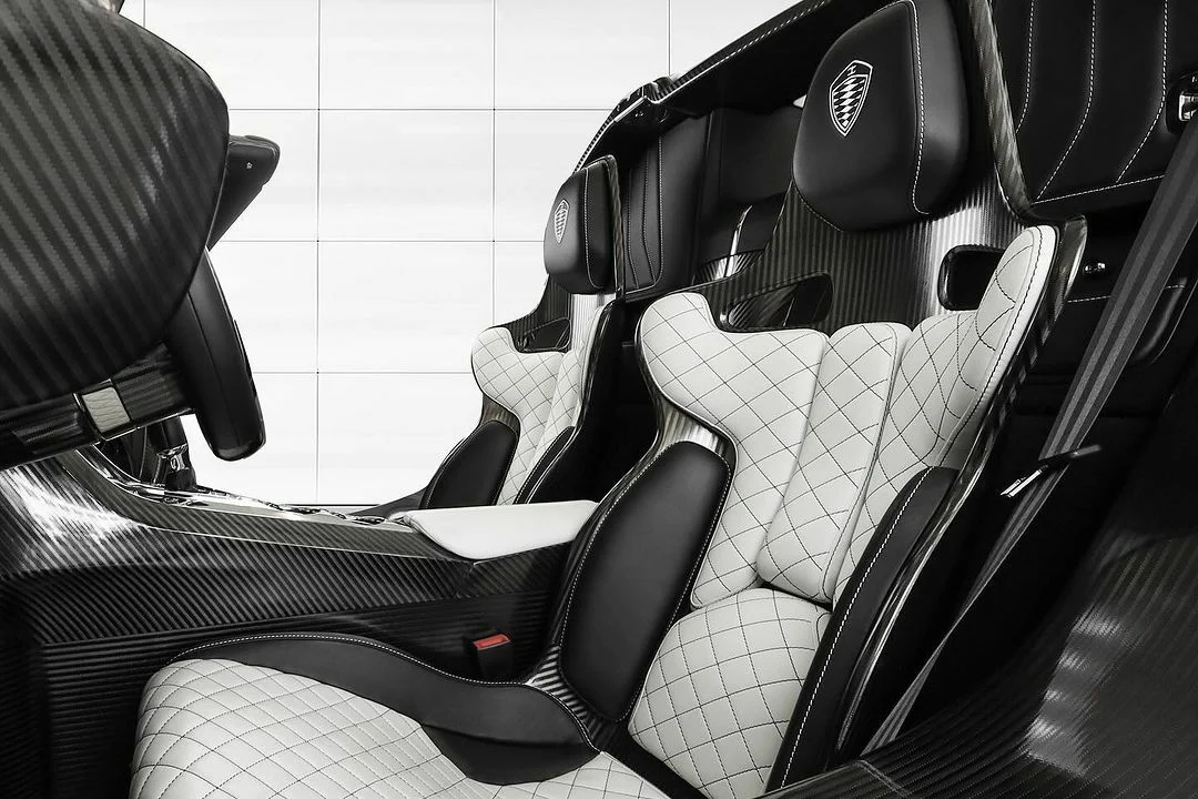 Koenigsegg Jesko Attack, Mansory upgrade, hypercar customization, luxury supercar, carbon fiber aerodynamics, high performance car, E85 biofuel, automotive tuning 4