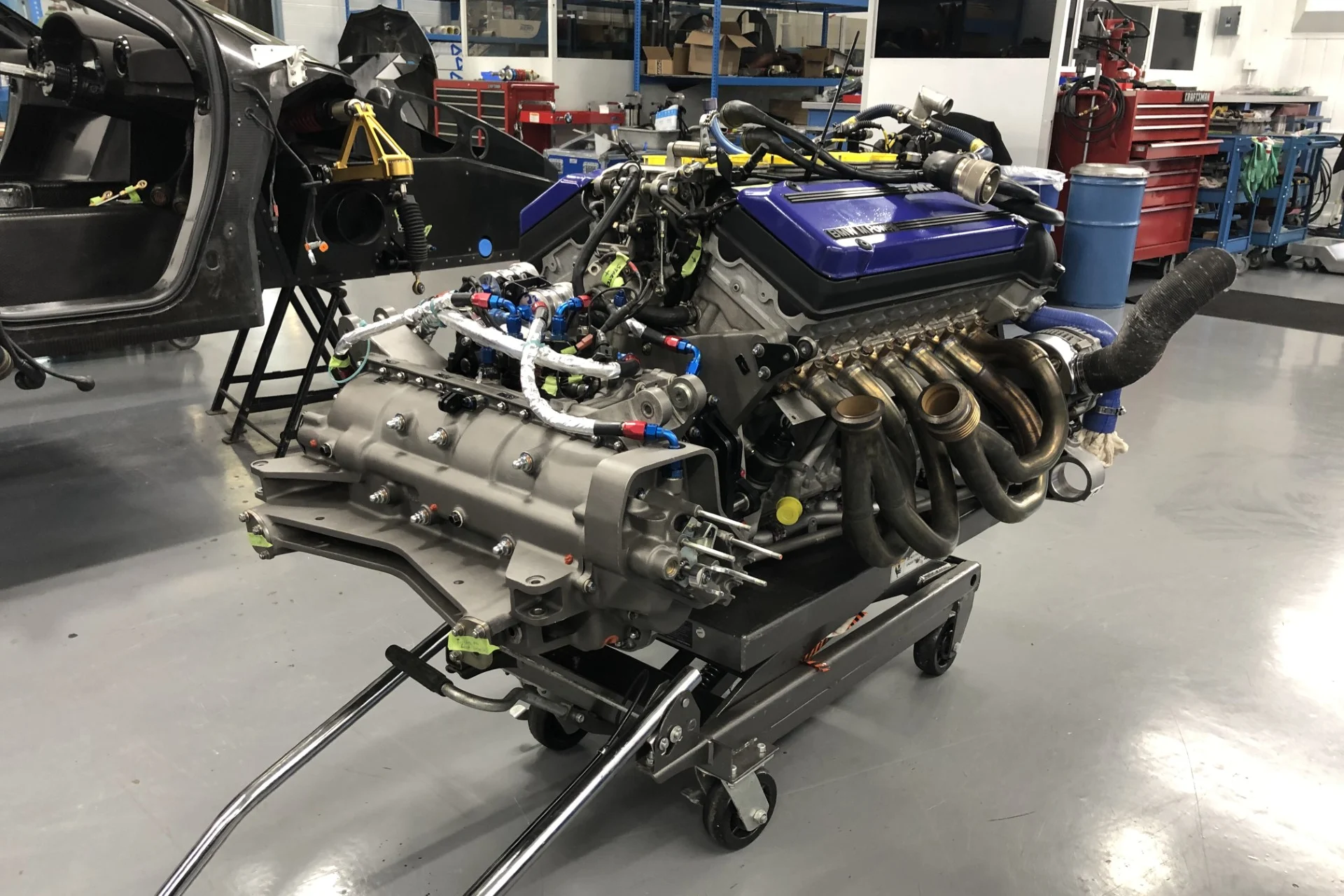 McLaren F1 GTR, supercar maintenance, classic car restoration, BMW Group Classic, high-performance vehicle upkeep, rare automotive heritage 4