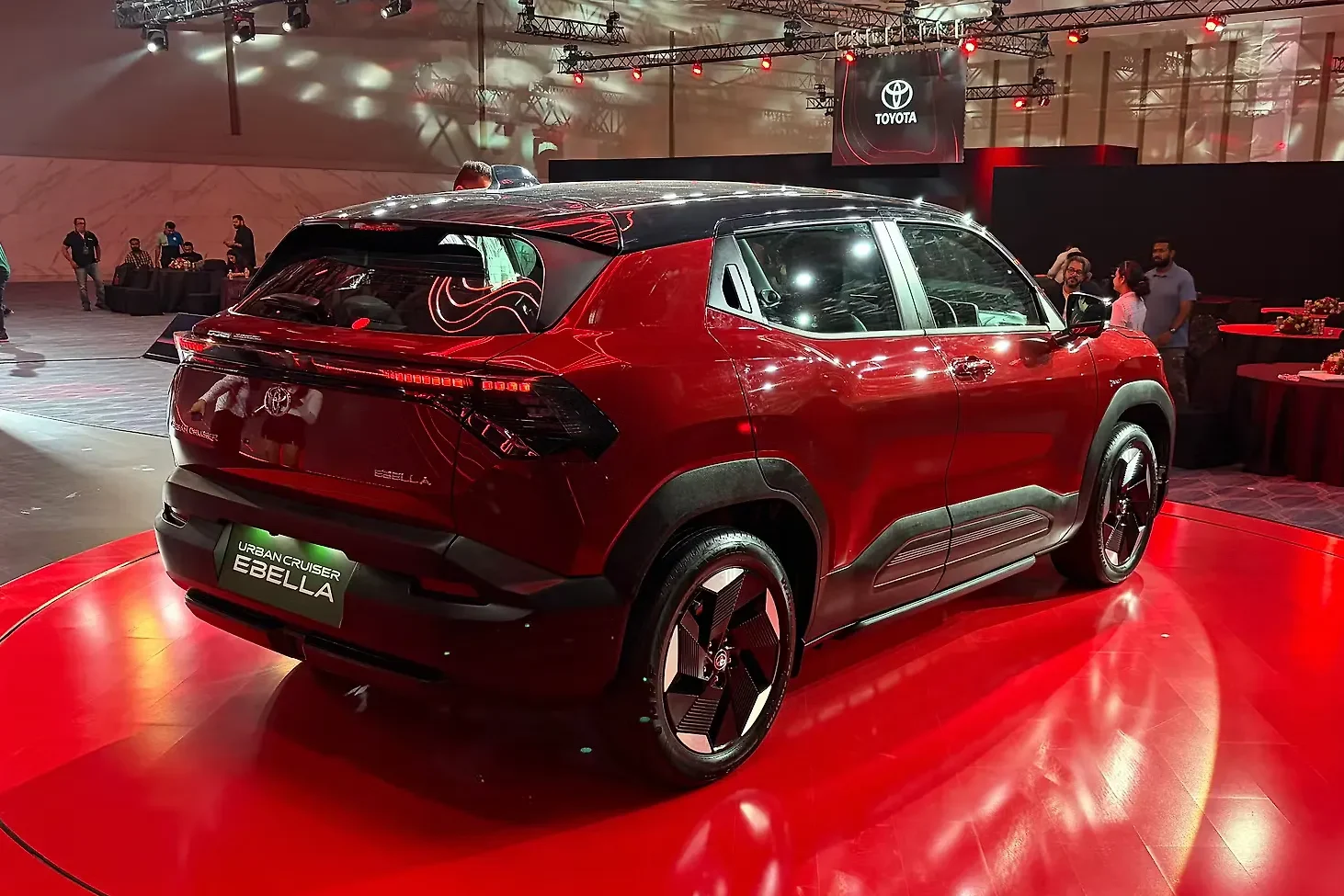 Toyota electric SUV, India EV market, Urban Cruiser Ebella, electric vehicle competition, EV charging infrastructure, Toyota Suzuki partnership, EV investment India 6