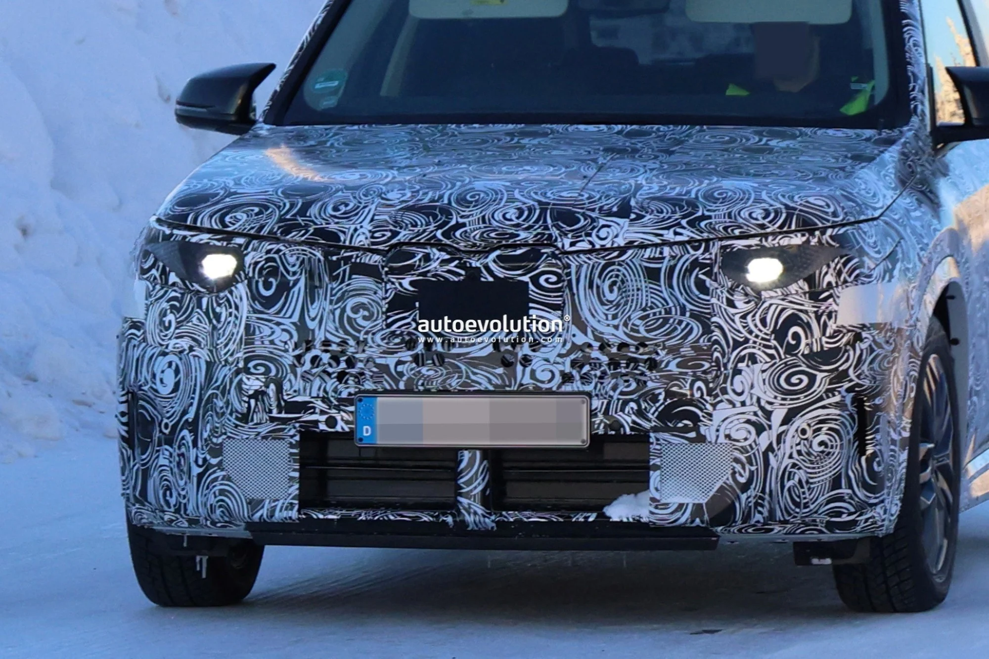 BMW X1 2028, BMW X1 redesign, BMW X1 test drive, luxury compact SUV, active aerodynamics, iDrive X, panoramic vision display, Euro 7 SUV 3