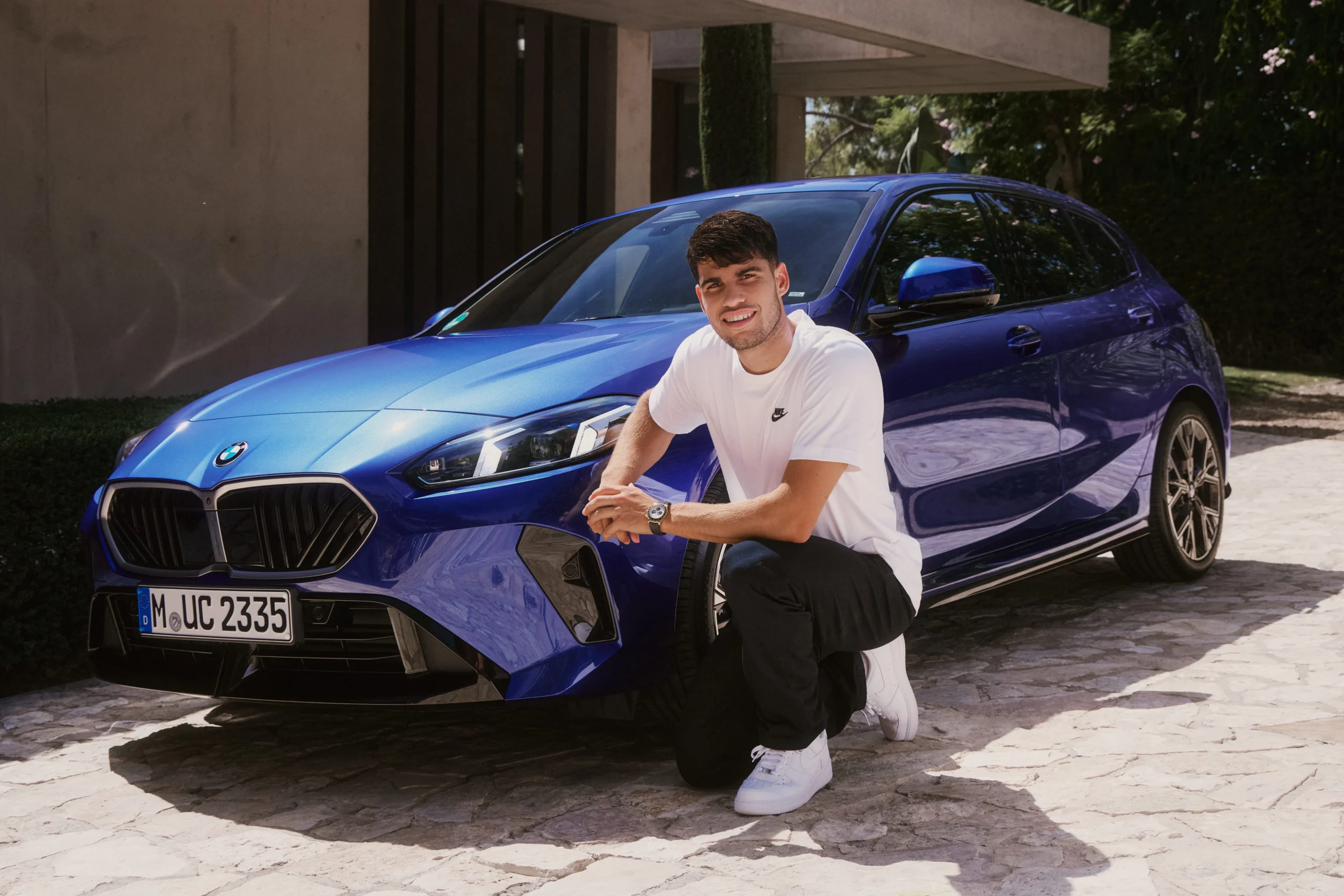 Carlos Alcaraz, BMW 1 Series, tennis star lifestyle, luxury car choices, Rolex Daytona, Australian Open champion, modest celebrity cars 3