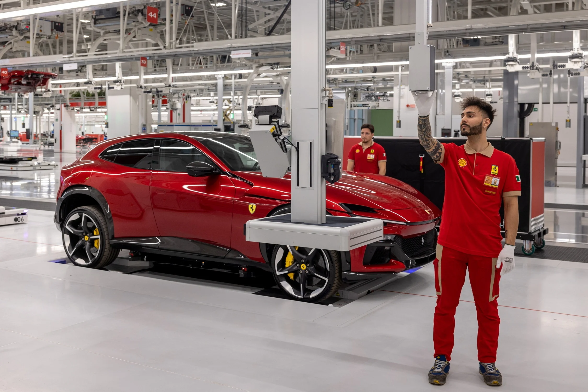 Ferrari bonus, employee incentive, automotive profits, Ferrari earnings 2024, electric Ferrari, Ferrari Luce, hybrid cars, luxury car industry 3