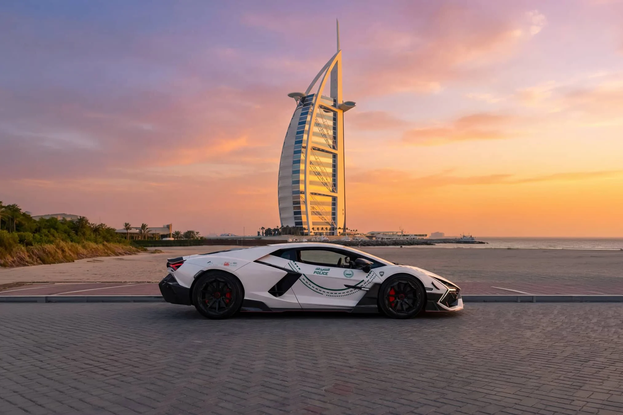 Lamborghini Revuelto, Mansory Initiate, Dubai Police supercar, high-performance luxury car, $1.1 million hypercar, V12 supercar, aftermarket tuning, exotic police vehicle 3