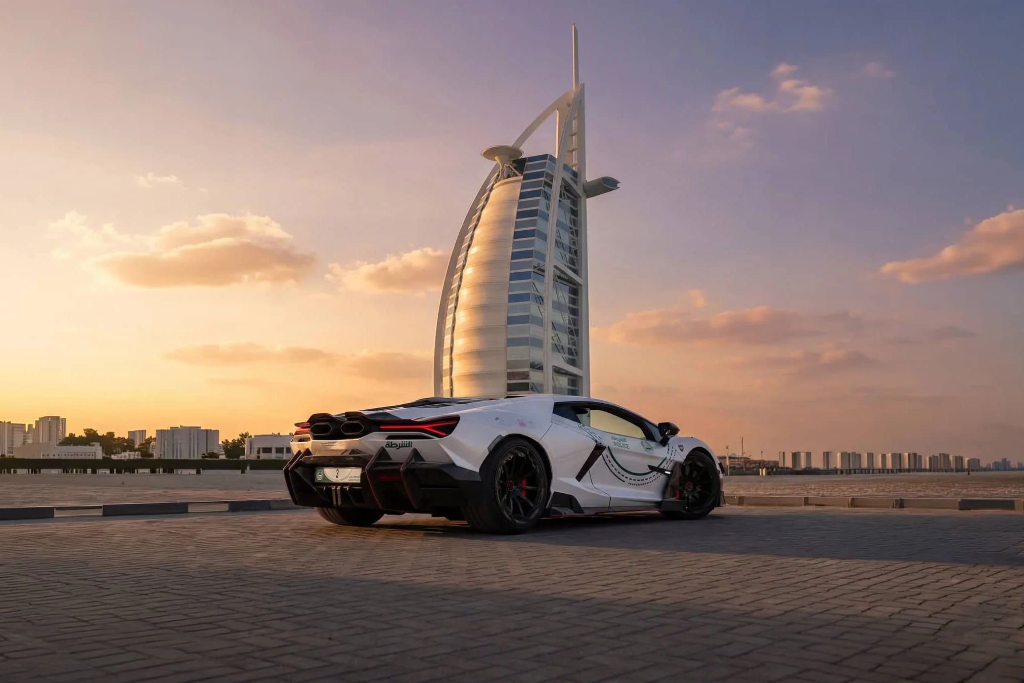 Lamborghini Revuelto, Mansory Initiate, Dubai Police supercar, high-performance luxury car, $1.1 million hypercar, V12 supercar, aftermarket tuning, exotic police vehicle 4