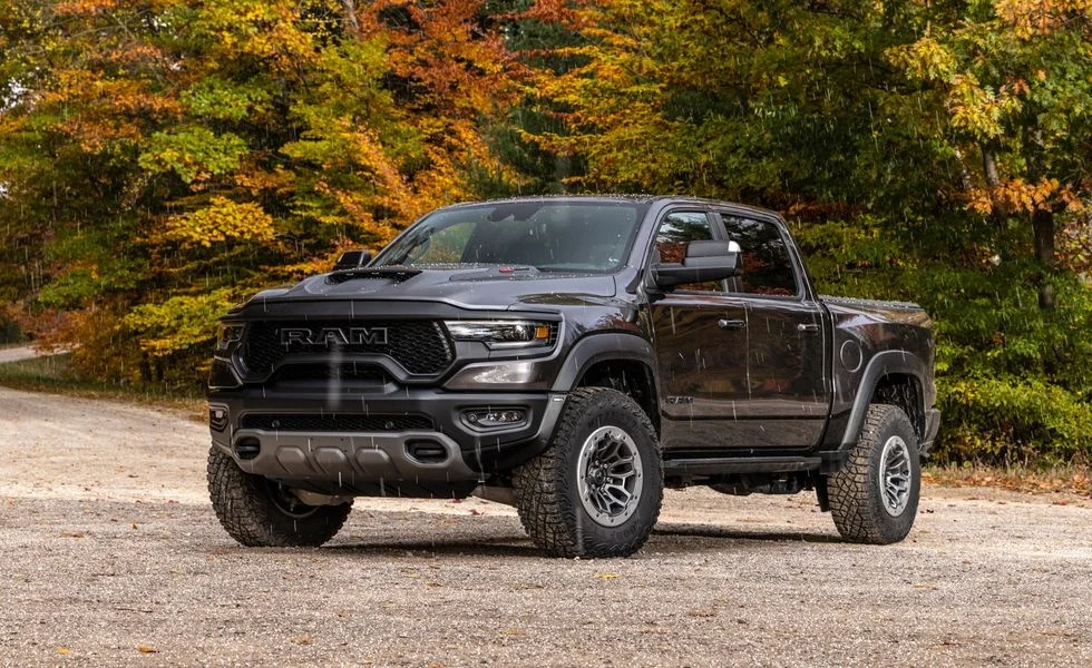 sports car price increase, US car market prices, luxury truck price surge, electric vehicle price decline, Kelley Blue Book report, car pricing trends 2024, Porsche price hike, EV incentives 2