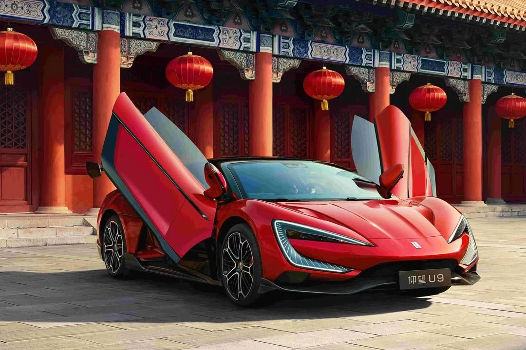 BYD sales, electric vehicle market, Chinese EV industry, auto sales decline, EV competition, Tesla financing, Geely, automotive exports 2