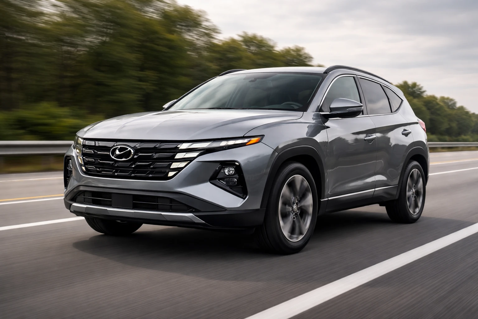 Hyundai Tucson Hybrid driving on highway showing fuel efficiency and smooth ride