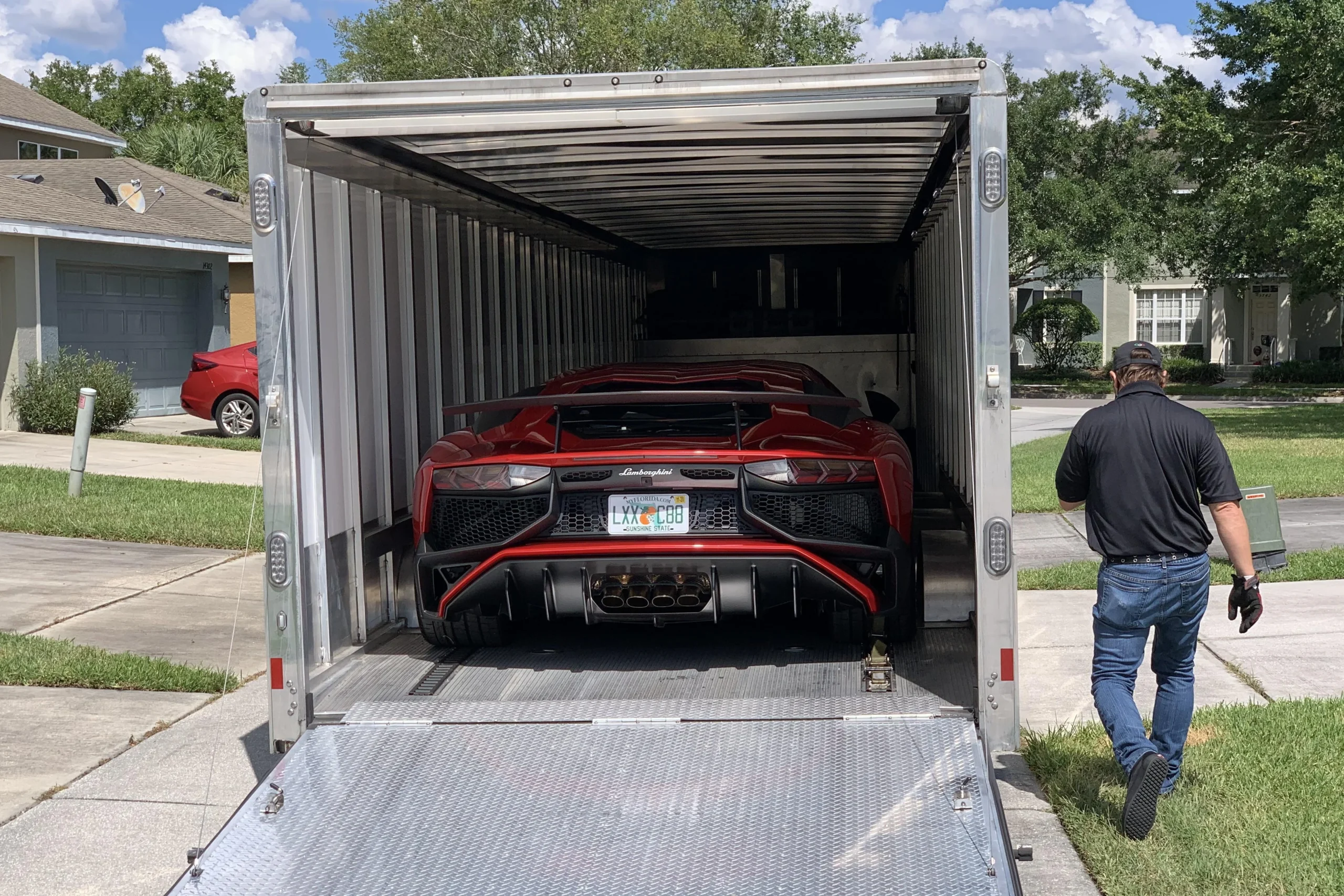 Lamborghini profit, electric car cancellation, US tariffs, luxury supercars, hybrid Lamborghini, automotive earnings, Lamborghini Revuelto, Ferrari EV competition 4