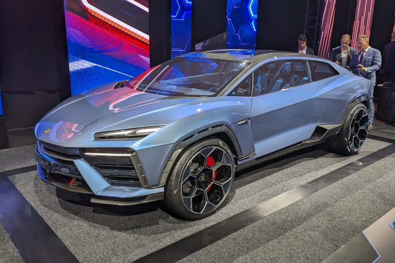 Lamborghini profit, electric car cancellation, US tariffs, luxury supercars, hybrid Lamborghini, automotive earnings, Lamborghini Revuelto, Ferrari EV competition 5