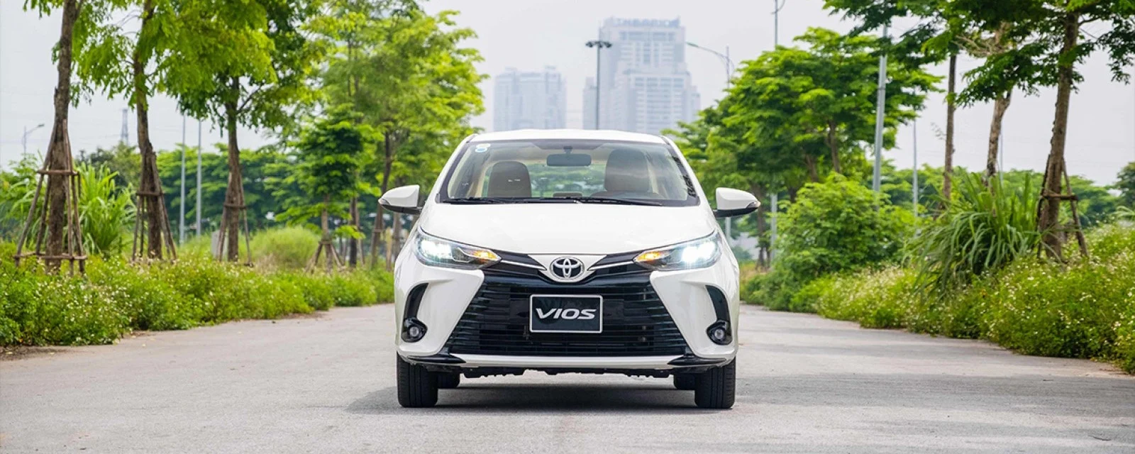 Toyota Vios, affordable sedan Vietnam, fuel efficient car, reliable family car, Toyota Vios price, Vios review, Vietnam car market 2