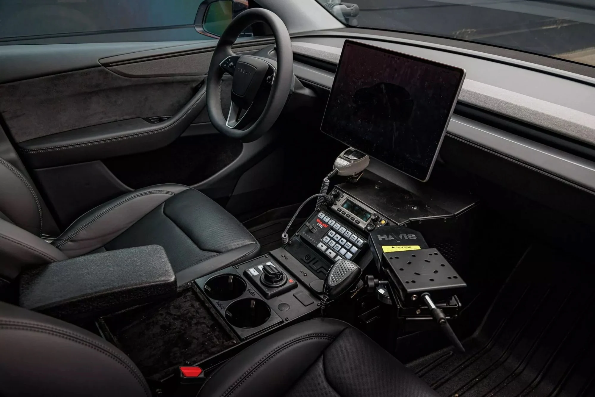 Tesla police car, electric patrol vehicle, Model Y police, police fleet savings, electric police SUV, Tesla Model Y patrol, law enforcement EV 5