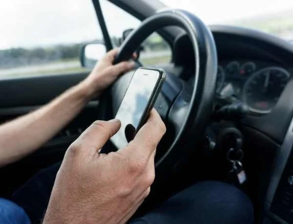 distracted driving, TikTok while driving, road safety US, NHTSA statistics, smartphone distraction, teen driving risks, infotainment system safety 3