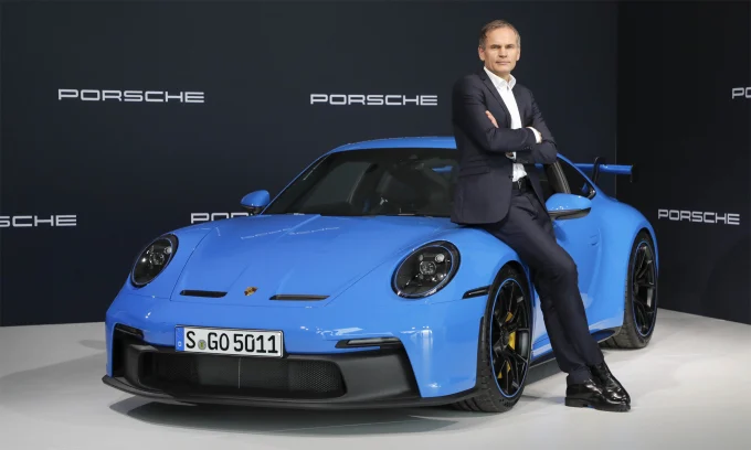 Volkswagen, Oliver Blume, Chinese automotive industry, German carmakers, EV tariffs, automotive restructuring, job cuts, EU subsidies 2