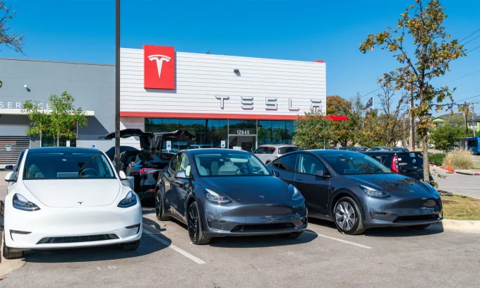 Tesla lawsuit, North Dakota dealership laws, EV direct sales, electric vehicle regulations, Tesla franchise model, automotive law 2