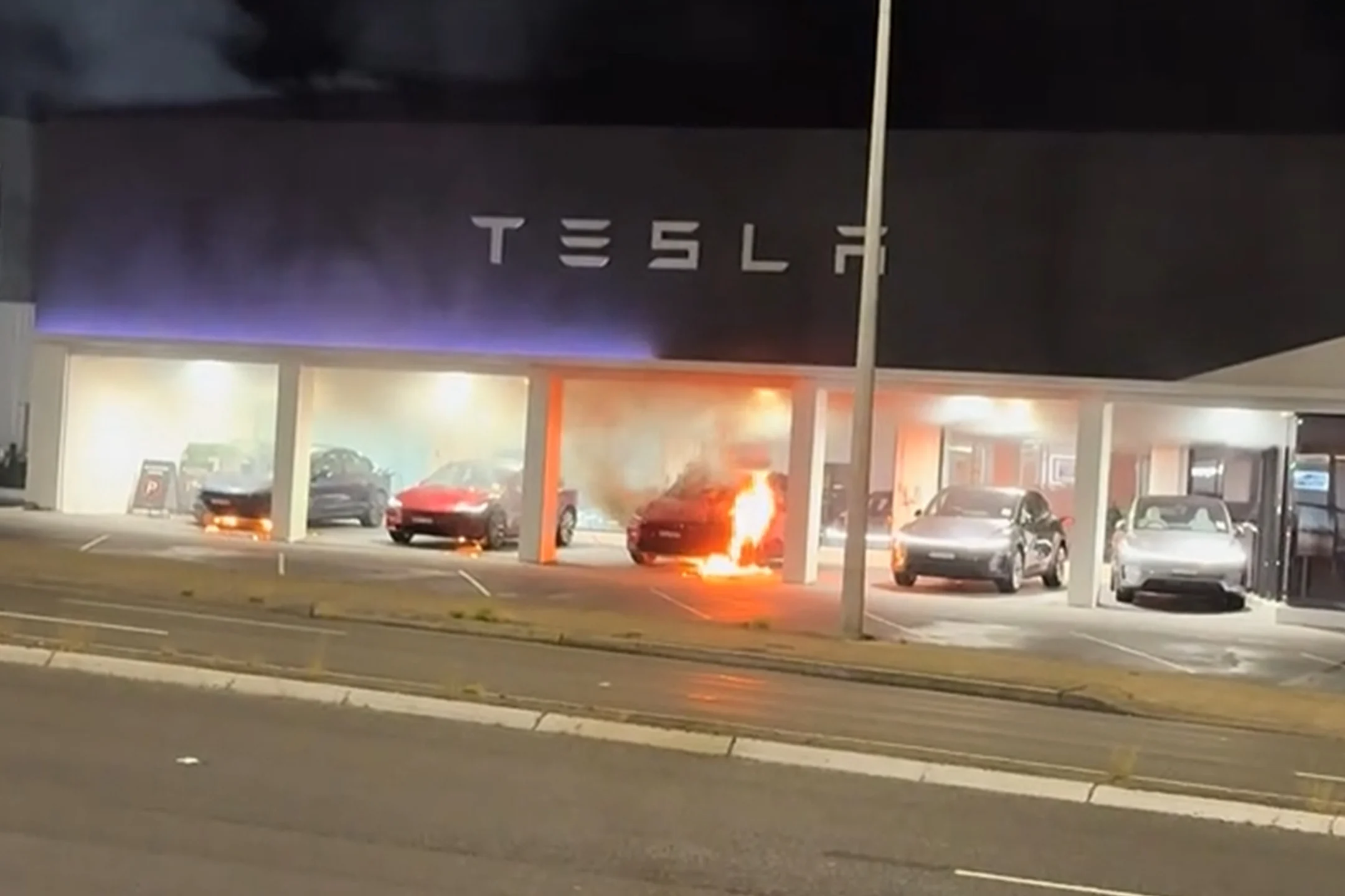 Tesla Sydney arson, Tesla showroom fire, EV vandalism, Elon Musk controversy, Tesla Model 3 fire, Tesla Model Y fire, Australia EV news 2