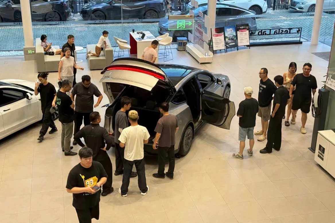 Tesla Canada, Chinese EV tariffs, Giga Shanghai, electric vehicle market, BYD Canada, EV import quotas, Canada trade policy 2