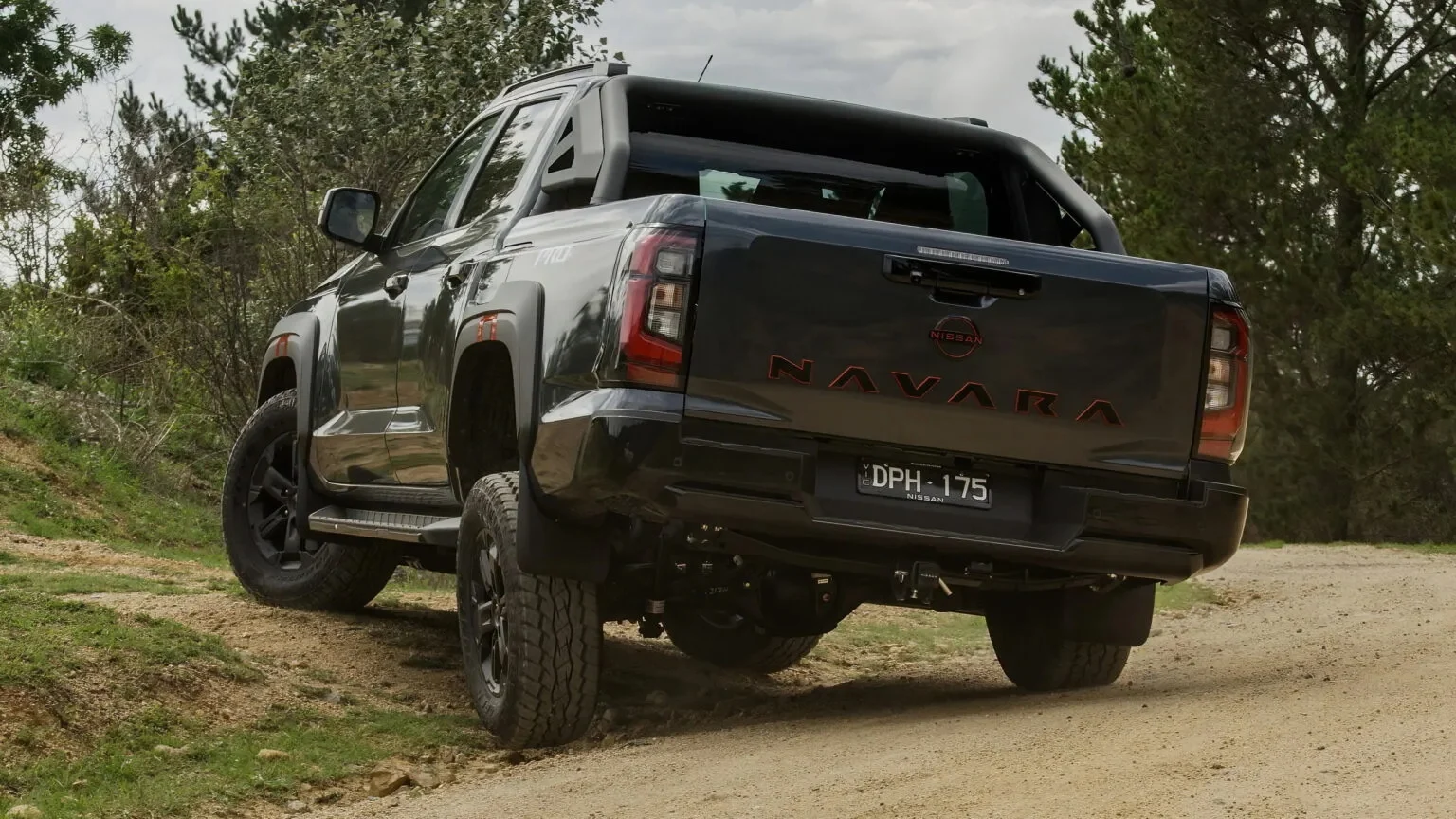 Nissan Navara, custom suspension, stock shocks removed, Australia pickup, Premcar, Mitsubishi Triton, off‑road performance, sustainable automotive 4