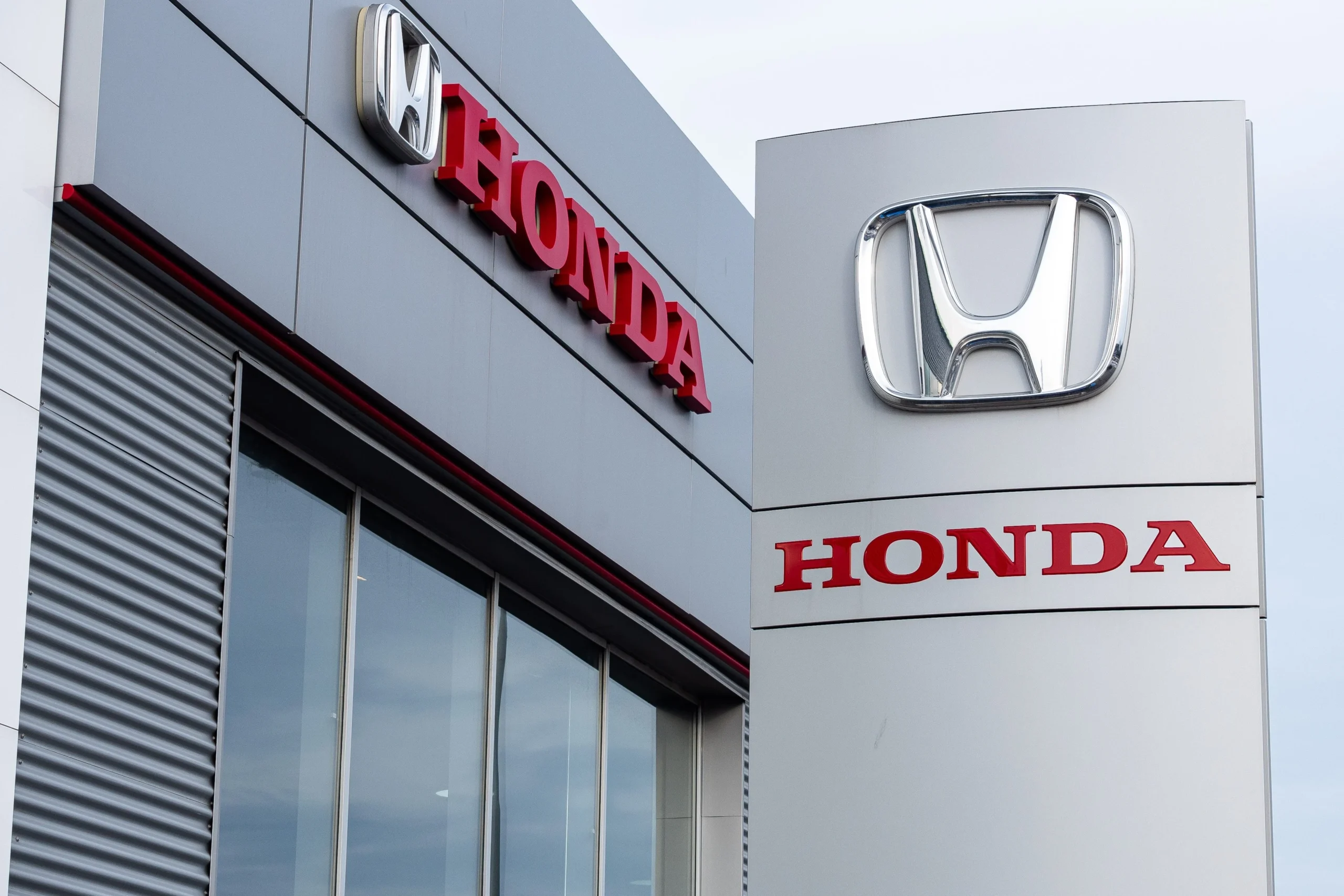 Honda EV strategy, Honda financial loss, Honda electric vehicles, automotive industry trends, Honda motorcycle profits, Honda Canada EV project 2
