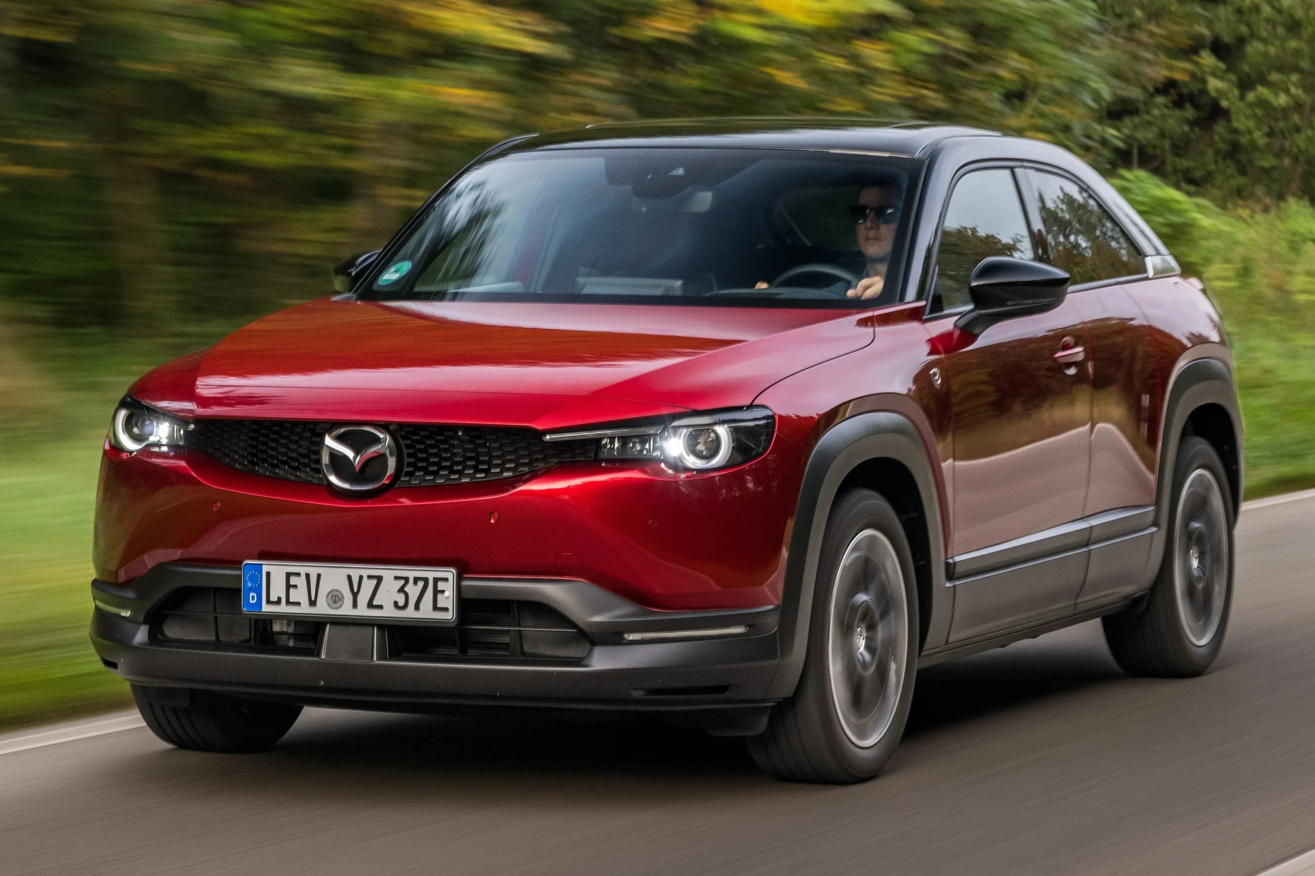 Mazda EV strategy, Mazda hybrid cars, EV market demand US, Mazda Changan partnership, automotive industry trends 2030, Mazda CX-5 Hybrid 3