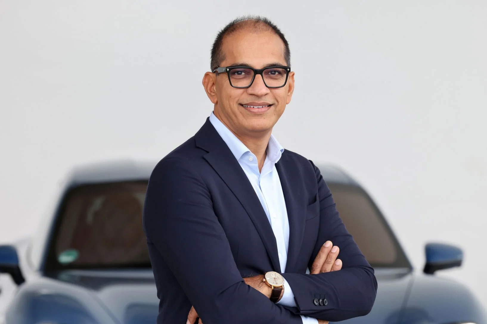 Porsche restructuring, Porsche executive board, luxury car market, Porsche EV strategy, Porsche China sales, automotive cost cutting 2