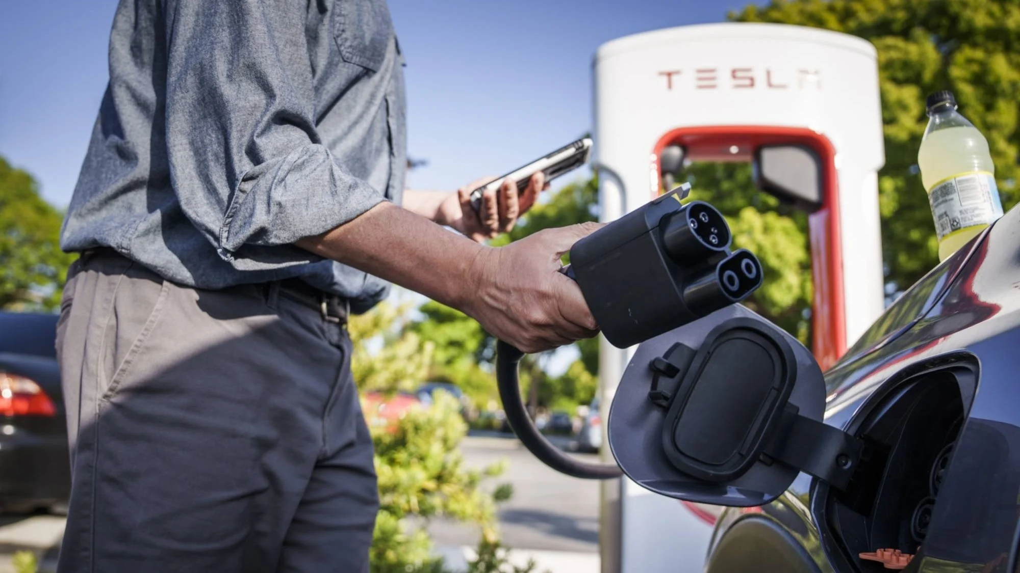 Tesla brand loyalty, S&P Global Mobility, EV market share US, Tesla Supercharger network, OTA updates, Tesla customer retention 5
