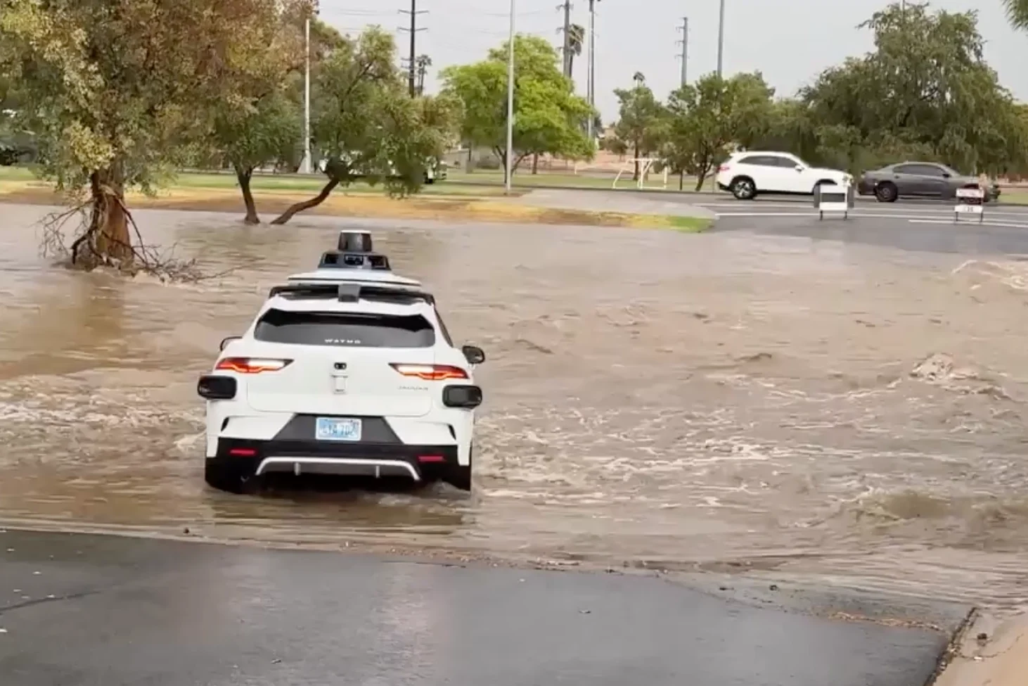 Waymo recall, robotaxi safety, autonomous vehicle accidents, NHTSA Waymo investigation, self-driving car floods, Alphabet Waymo 2