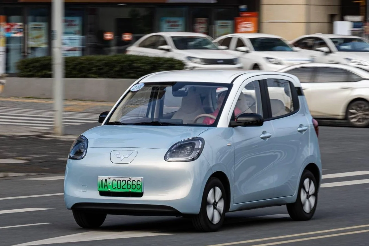 cheap cars in China, affordable EVs, Chinese automotive market, BYD Seagull, Wuling MiniEV, China vs US car prices, budget electric vehicles 2