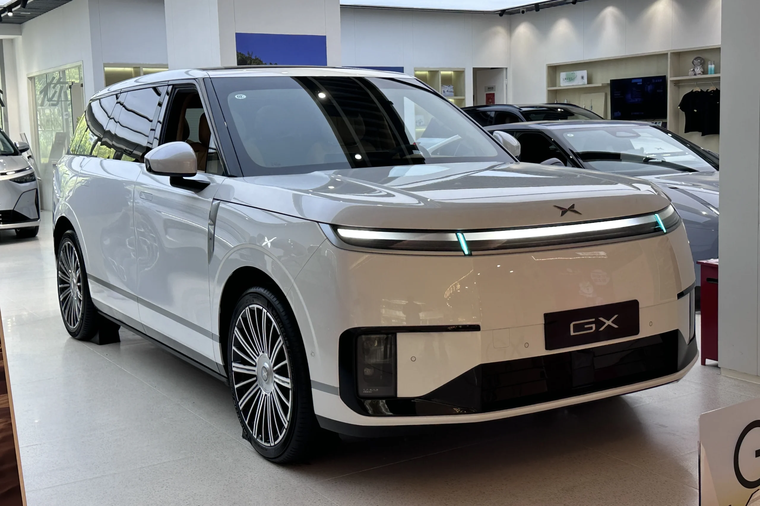 Chinese car makers, chip price increase, EV price war, automotive chip shortage, AI chip demand, Chinese electric vehicles, automotive industry profit squeeze 2