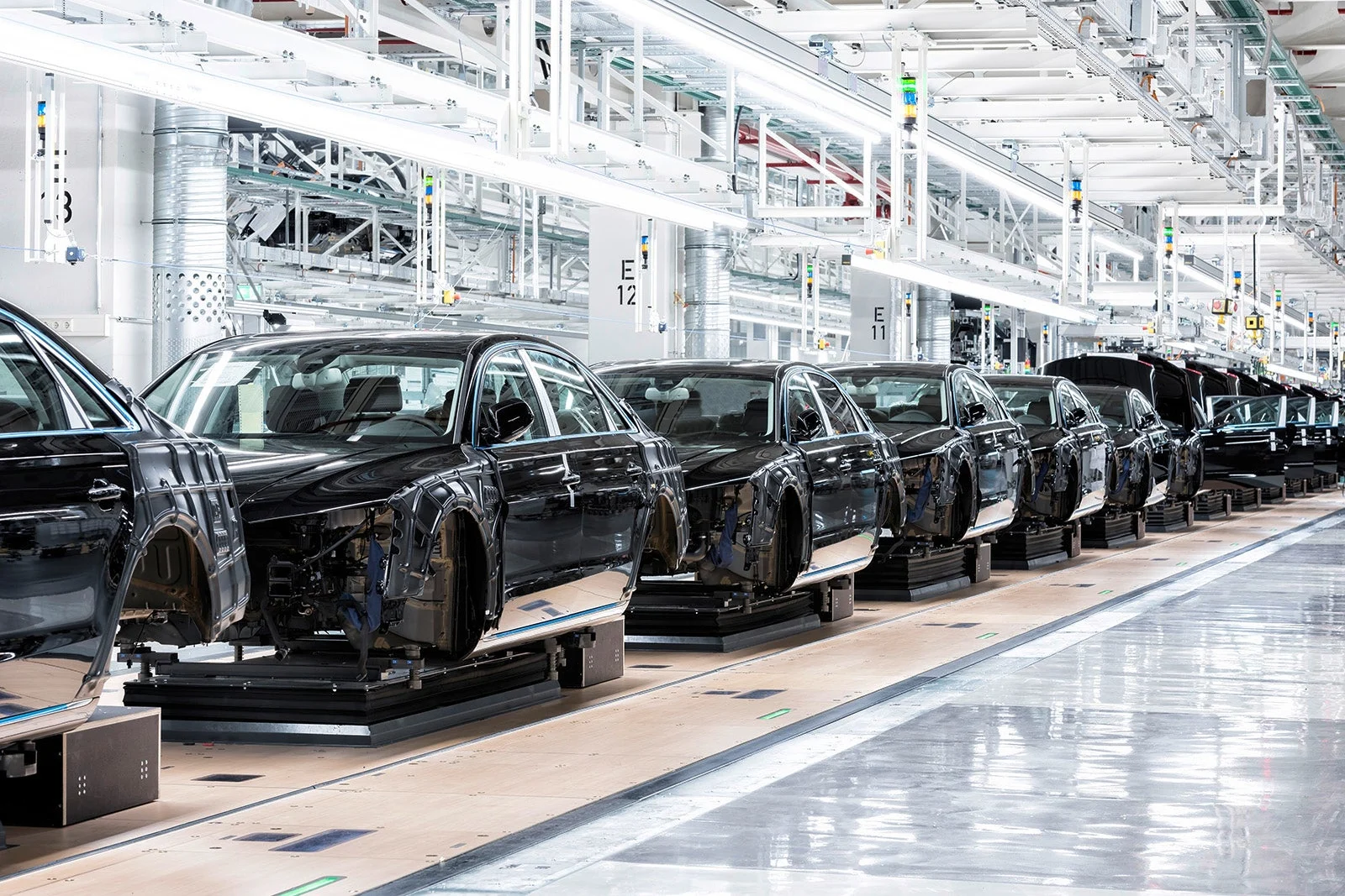 Volkswagen layoffs, German plant closures, auto industry restructuring, Chinese electric vehicles, EV competition, job cuts 2024, automotive news 2