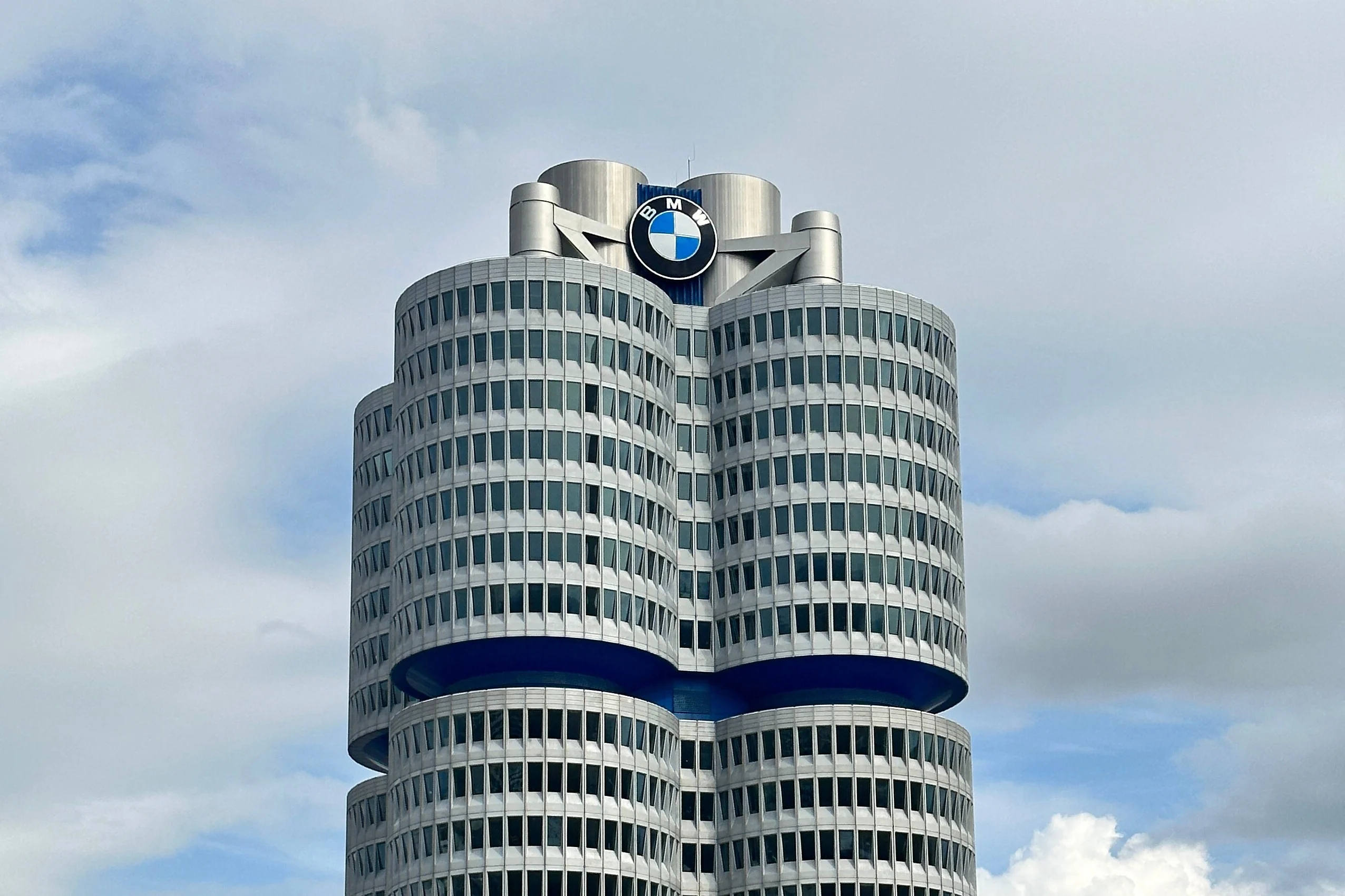 BMW profit forecast 2026, BMW earnings, China automotive slowdown, Middle East conflict impact, European car makers, auto industry outlook 2026, automotive market challenges 2