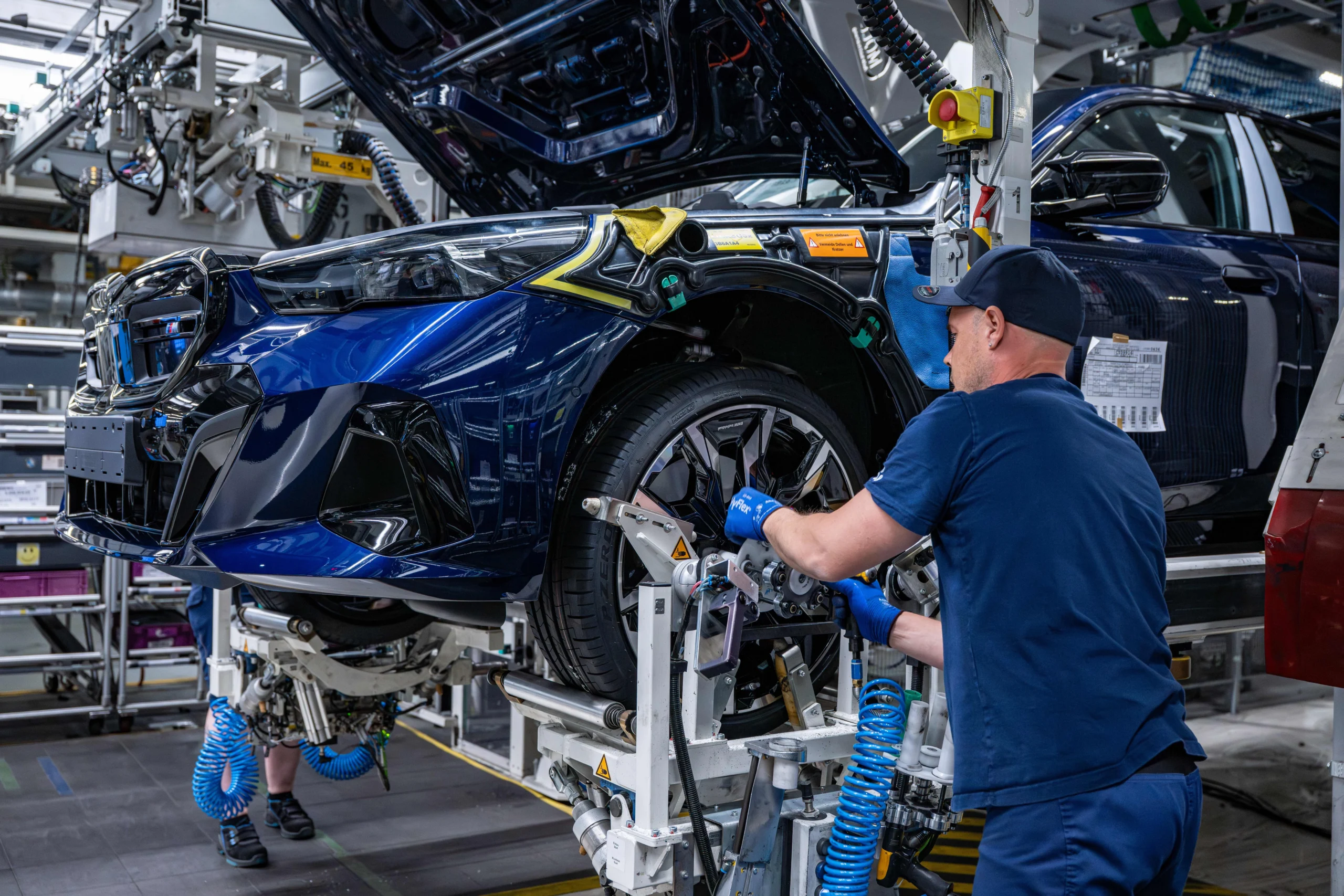 BMW profit warning, BMW cost cutting, BMW labor negotiations, automotive industry challenges, job cuts in Europe, BMW China market, car manufacturer restructuring 4