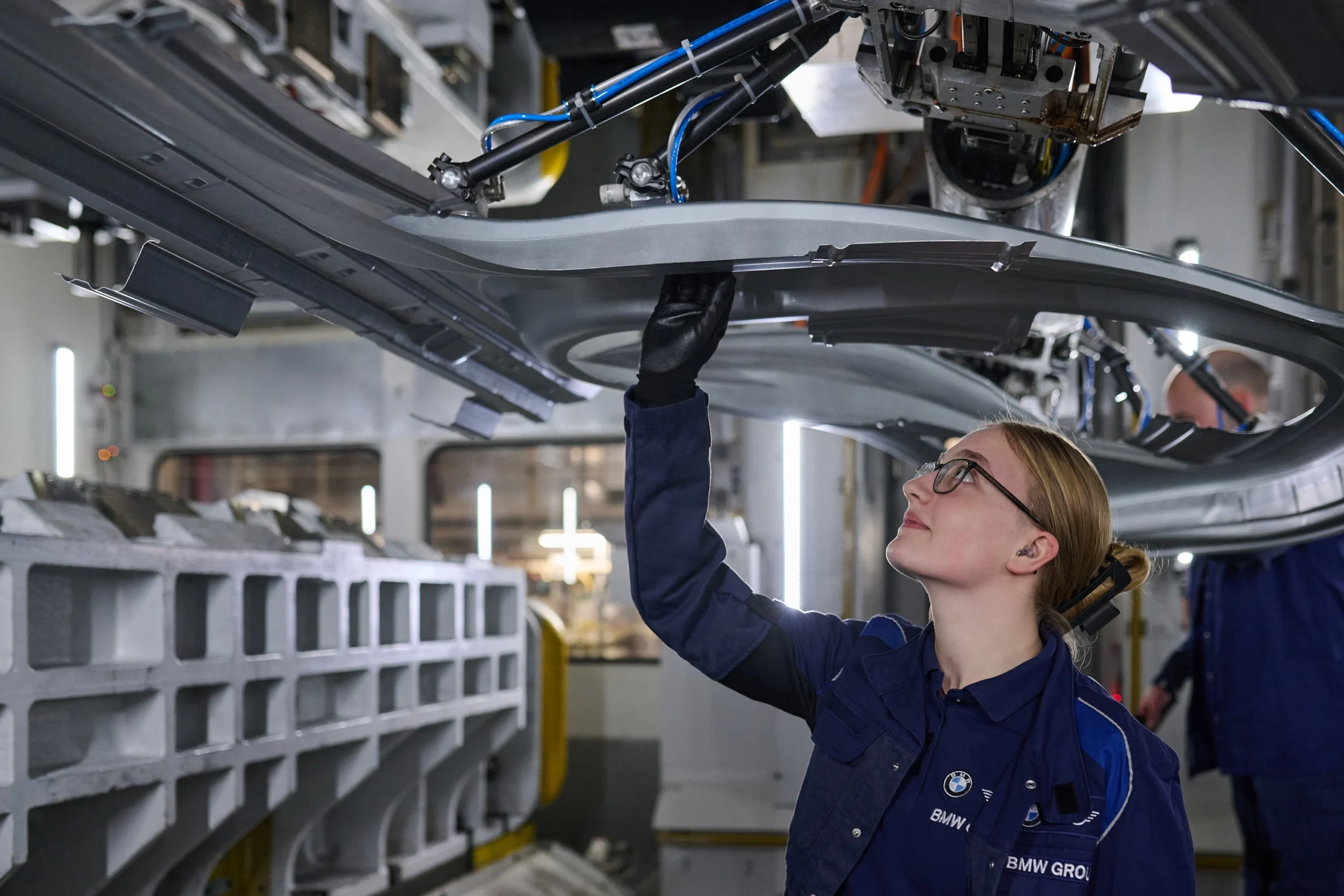 BMW profit warning, BMW cost cutting, BMW labor negotiations, automotive industry challenges, job cuts in Europe, BMW China market, car manufacturer restructuring 3