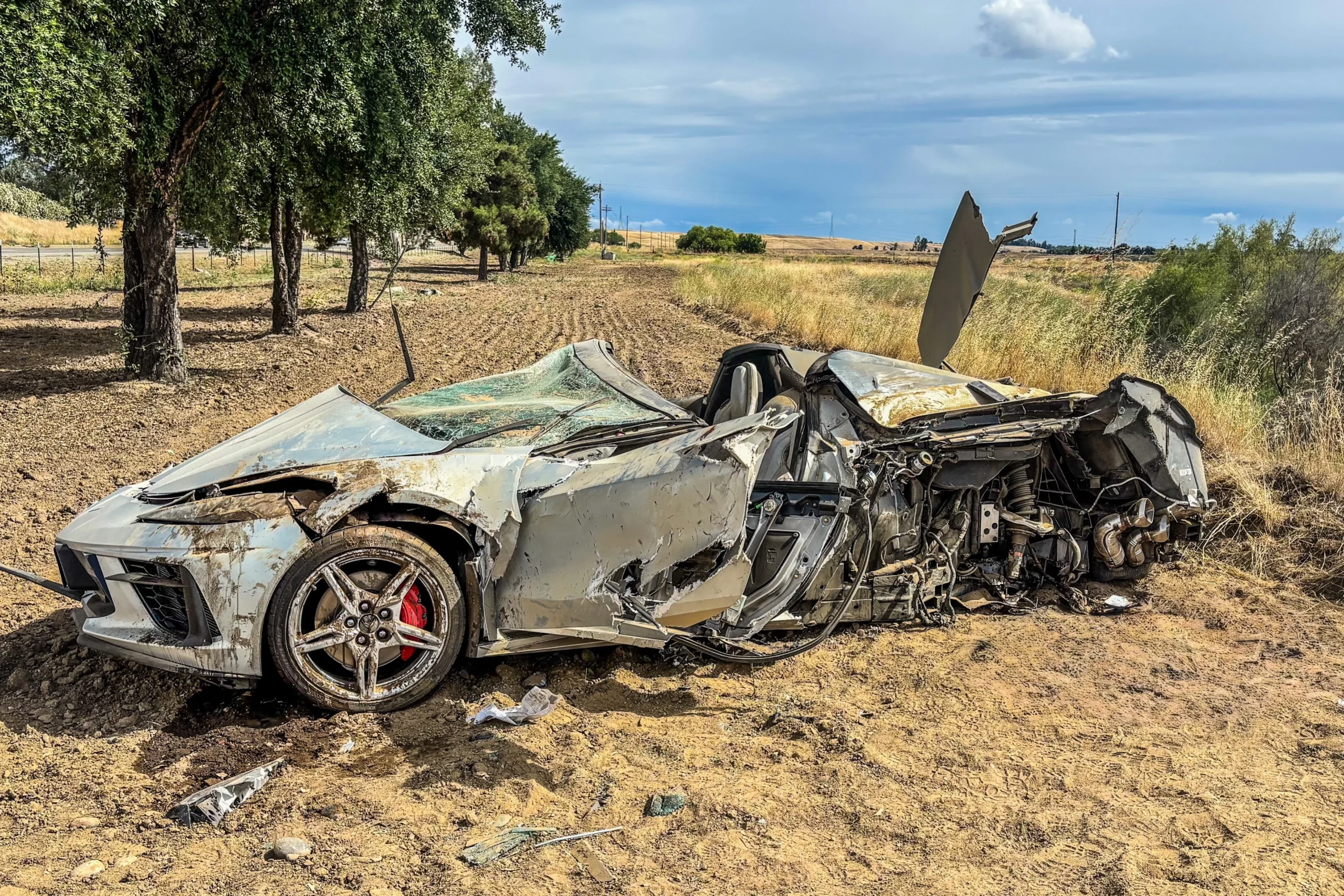 Chevrolet Corvette C8, car crash, Fresno California accident, driver survival, sports car safety, high speed collision, vehicle wreckage 2