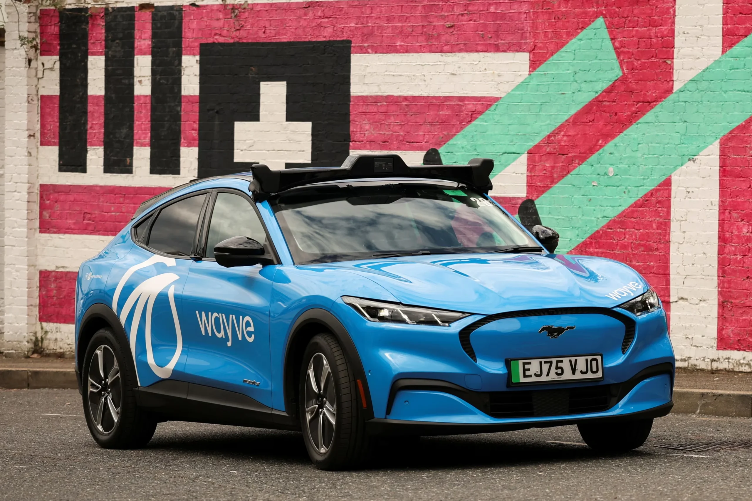 Uber robotaxi, London autonomous taxis, self-driving ride-hailing, Wayve AI, electric robotaxi, autonomous vehicles UK, Ford Mustang Mach-E 2