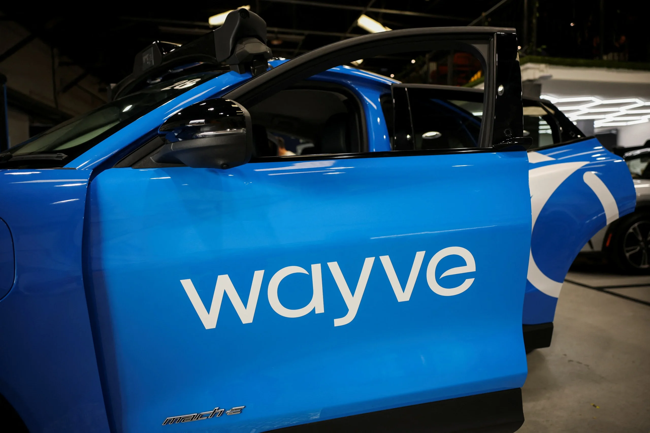 Uber robotaxi, London autonomous taxis, self-driving ride-hailing, Wayve AI, electric robotaxi, autonomous vehicles UK, Ford Mustang Mach-E 5