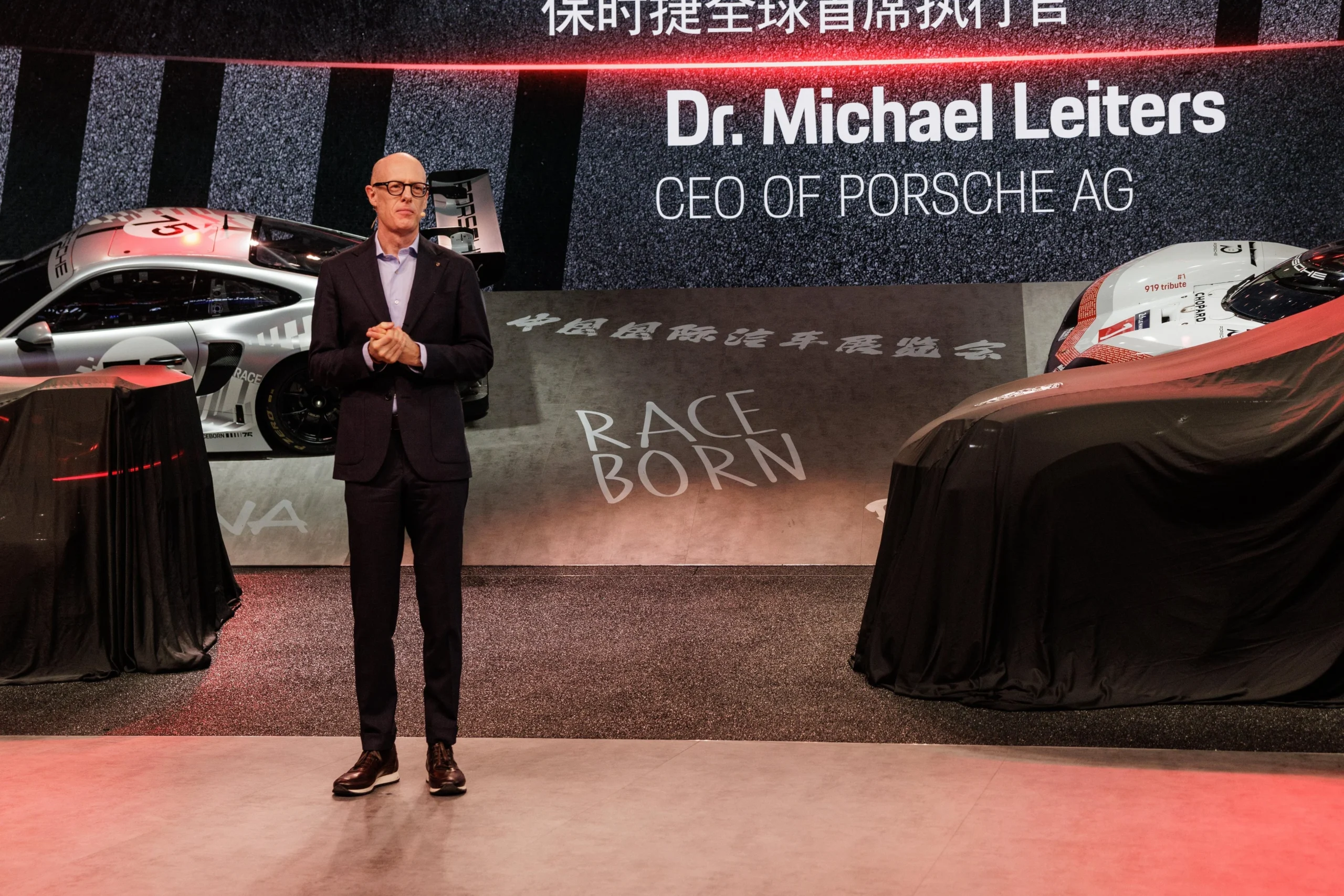 Porsche China, Porsche restructuring, luxury car market China, electric SUV, Porsche sales decline, automotive industry China, Porsche investors 2