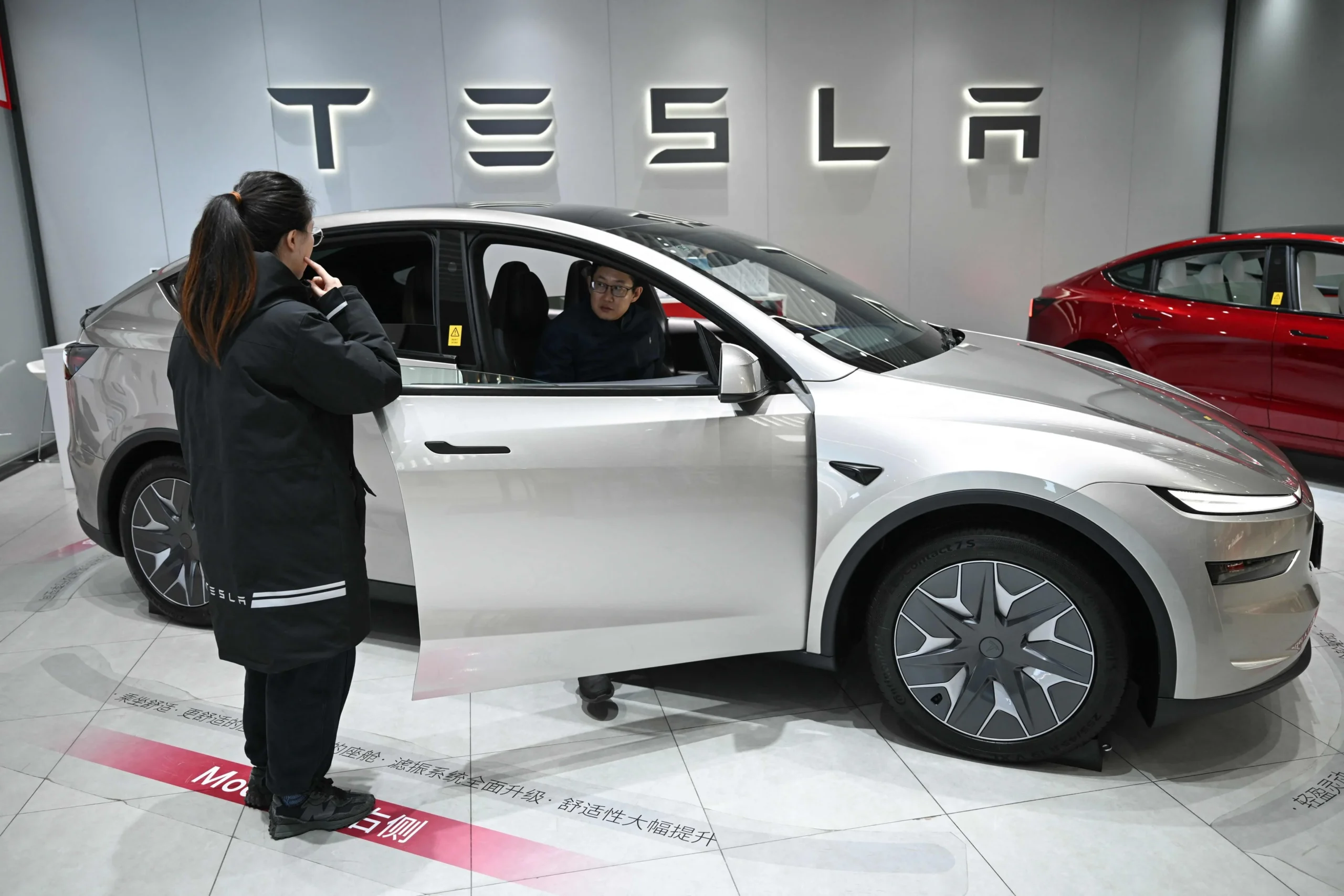 Tesla China sales, Tesla Model 3 China, Tesla Model Y China, electric vehicles China, BYD competition, EV market trends, China EV market 4