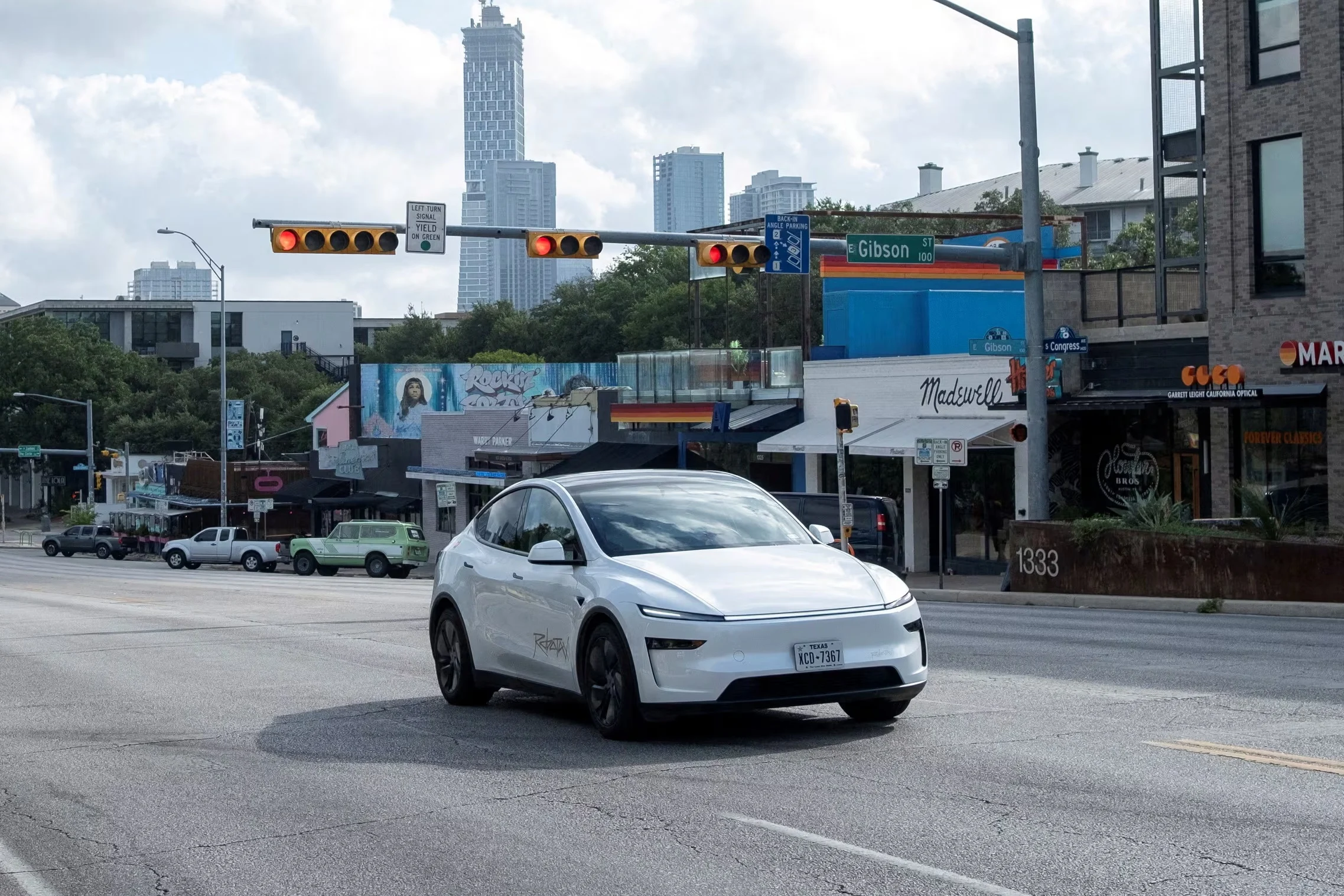 Tesla robotaxi, autonomous ride-hailing, self-driving cars, Full Self-Driving, Waymo, Texas autonomous vehicles, Elon Musk AI 2
