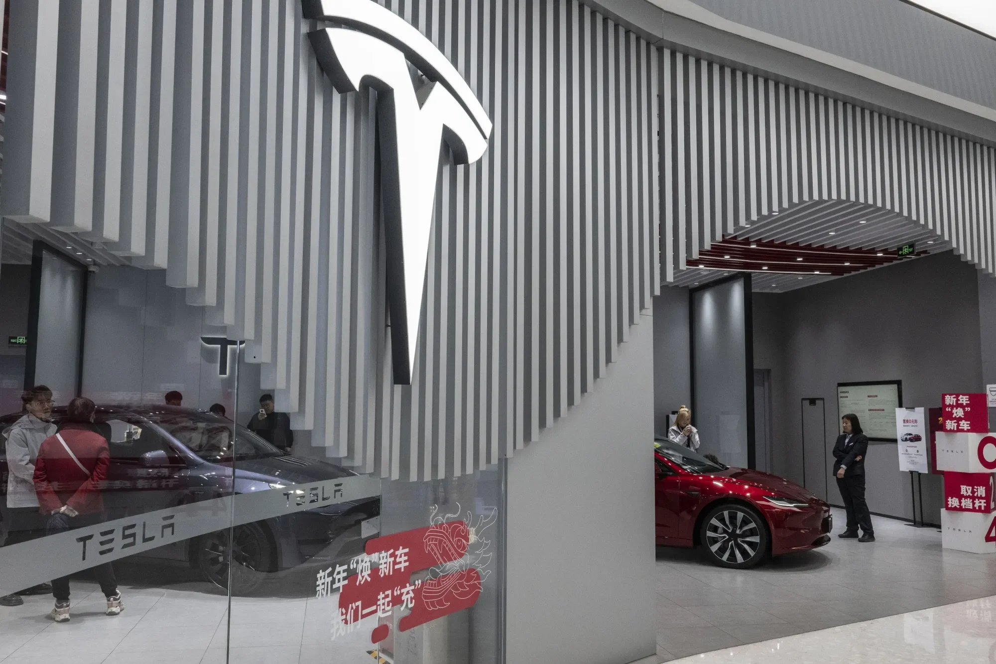 Tesla FSD, Tesla lawsuit China, Full Self-Driving, Tesla Assisted Driving, automotive consumer fraud, EV legal issues, Elon Musk 3