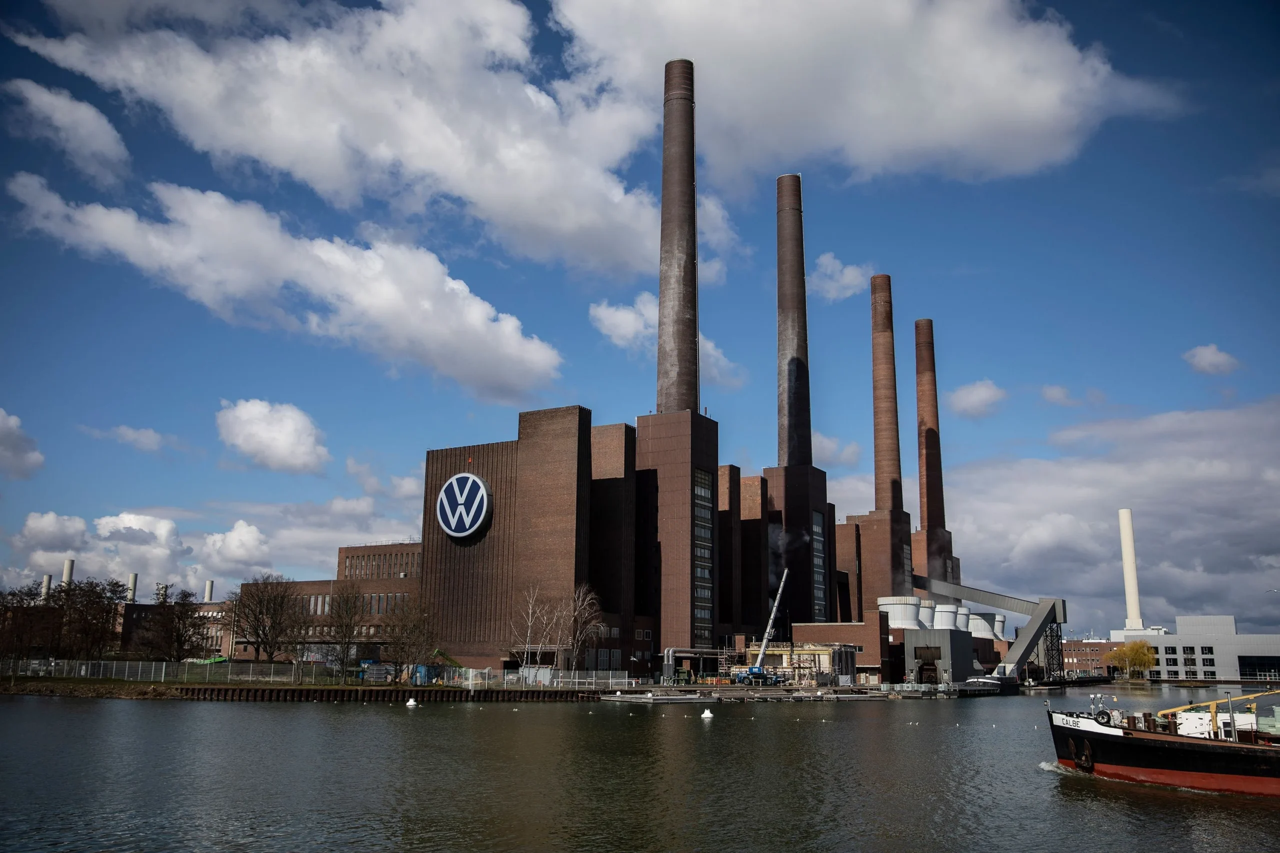 Volkswagen job cuts, Germany workforce reduction, automotive restructuring, EV transition, car industry competition, Volkswagen 2024 layoffs 2