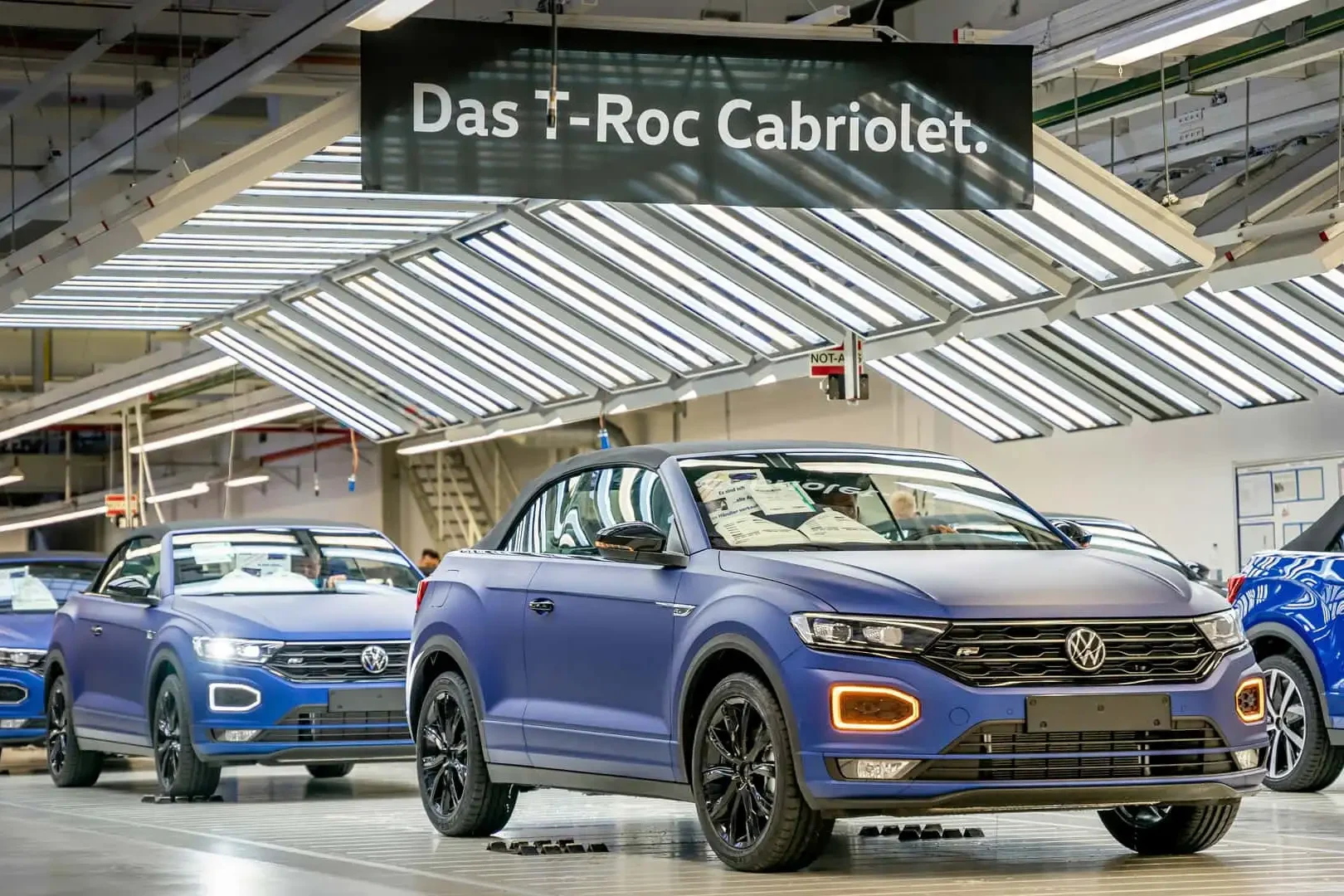 Volkswagen production cut, Osnabruck plant, T-Roc Cabriolet, German auto industry, automotive job losses, EV transition, defense partnership 2