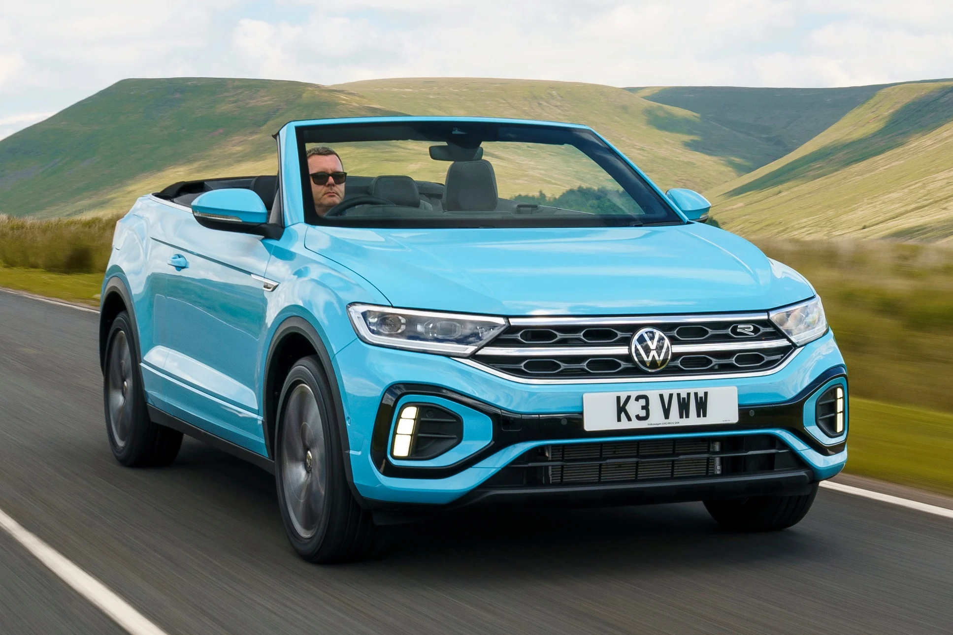 Volkswagen production cut, Osnabruck plant, T-Roc Cabriolet, German auto industry, automotive job losses, EV transition, defense partnership 3
