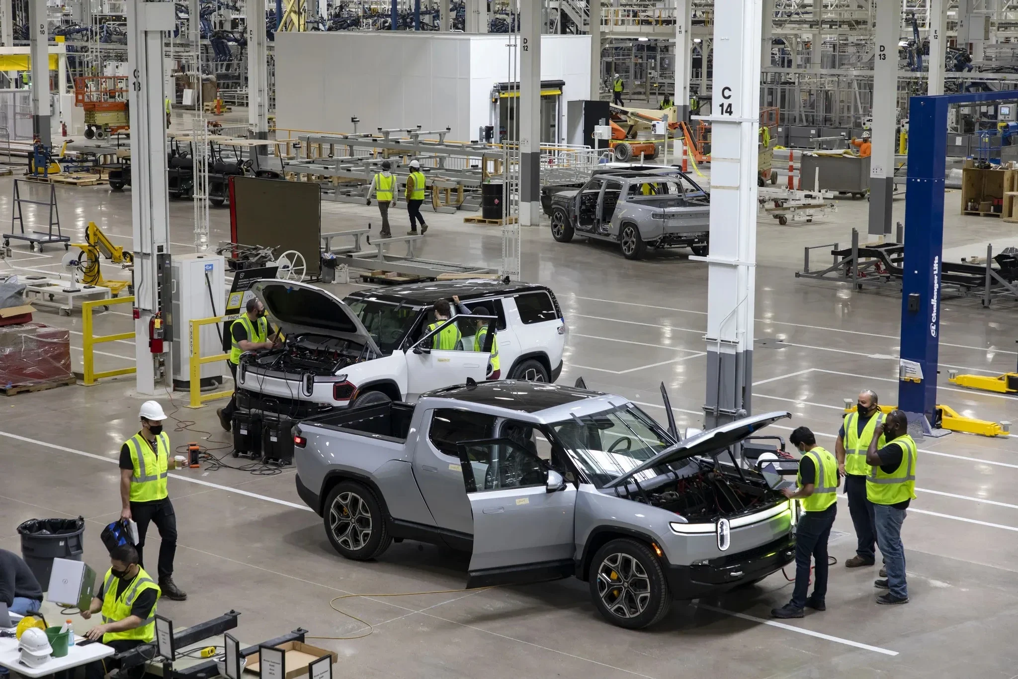 Rivian stock, secondary offering, EV market, Rivian R2 SUV, electric vehicle funding, US government loan, Rivian earnings 2026 3